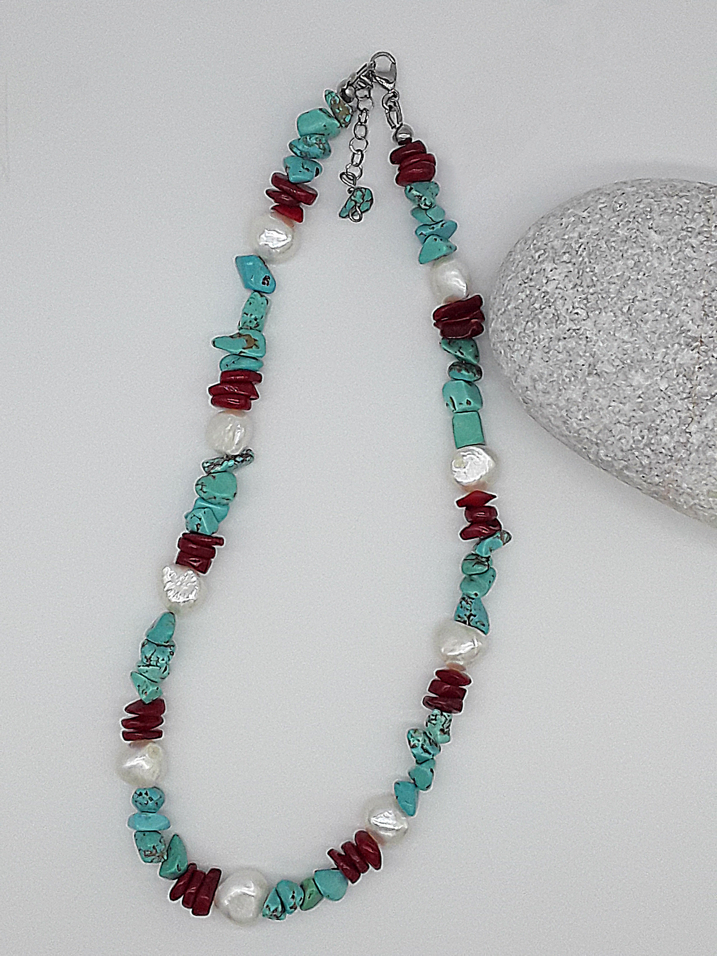 The Ocean’s Renewal Necklace by Polmadeva – turquoise, pearl and red coral necklace symbolizing the ocean’s rhythm and renewal