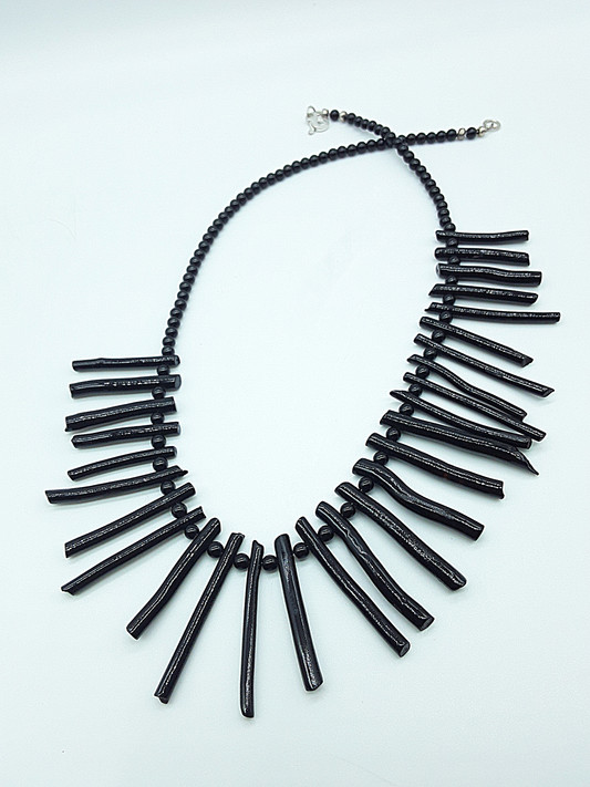 The Obsidian Coral Necklace by Polmadeva – black coral and 925 silver necklace symbolizing strength, protection, and quiet resilience