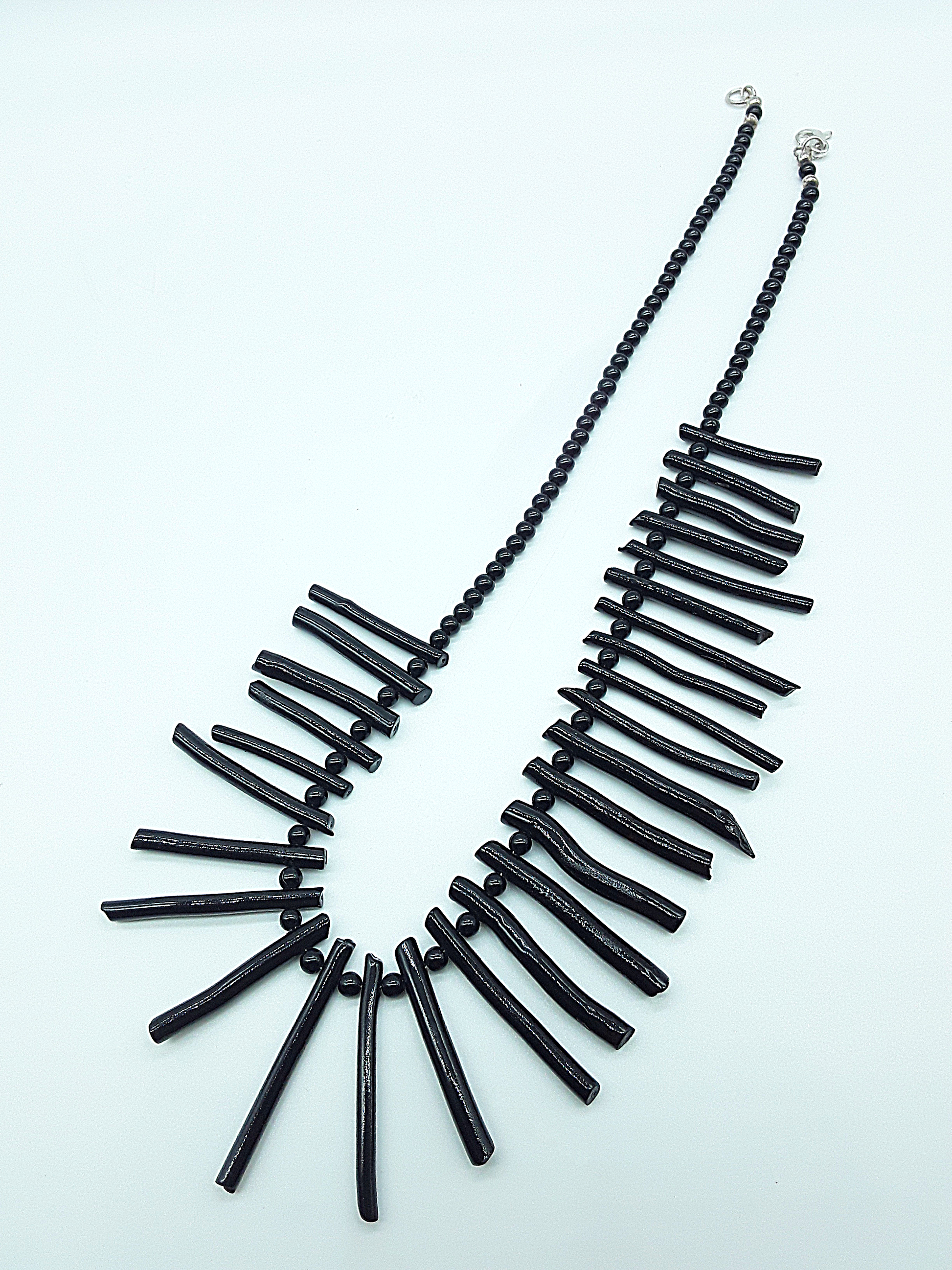 The Obsidian Coral Necklace by Polmadeva – black coral and 925 silver necklace symbolizing strength, protection, and quiet resilience