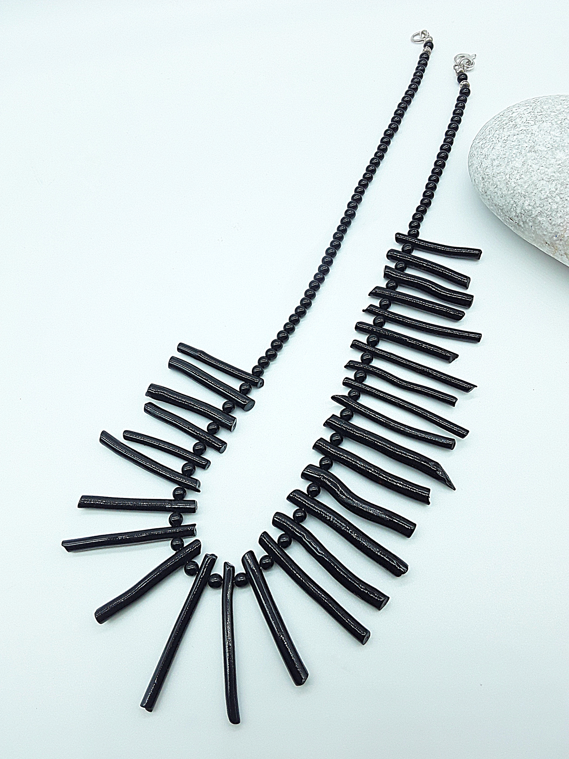 The Obsidian Coral Necklace by Polmadeva – black coral and 925 silver necklace symbolizing strength, protection, and quiet resilience