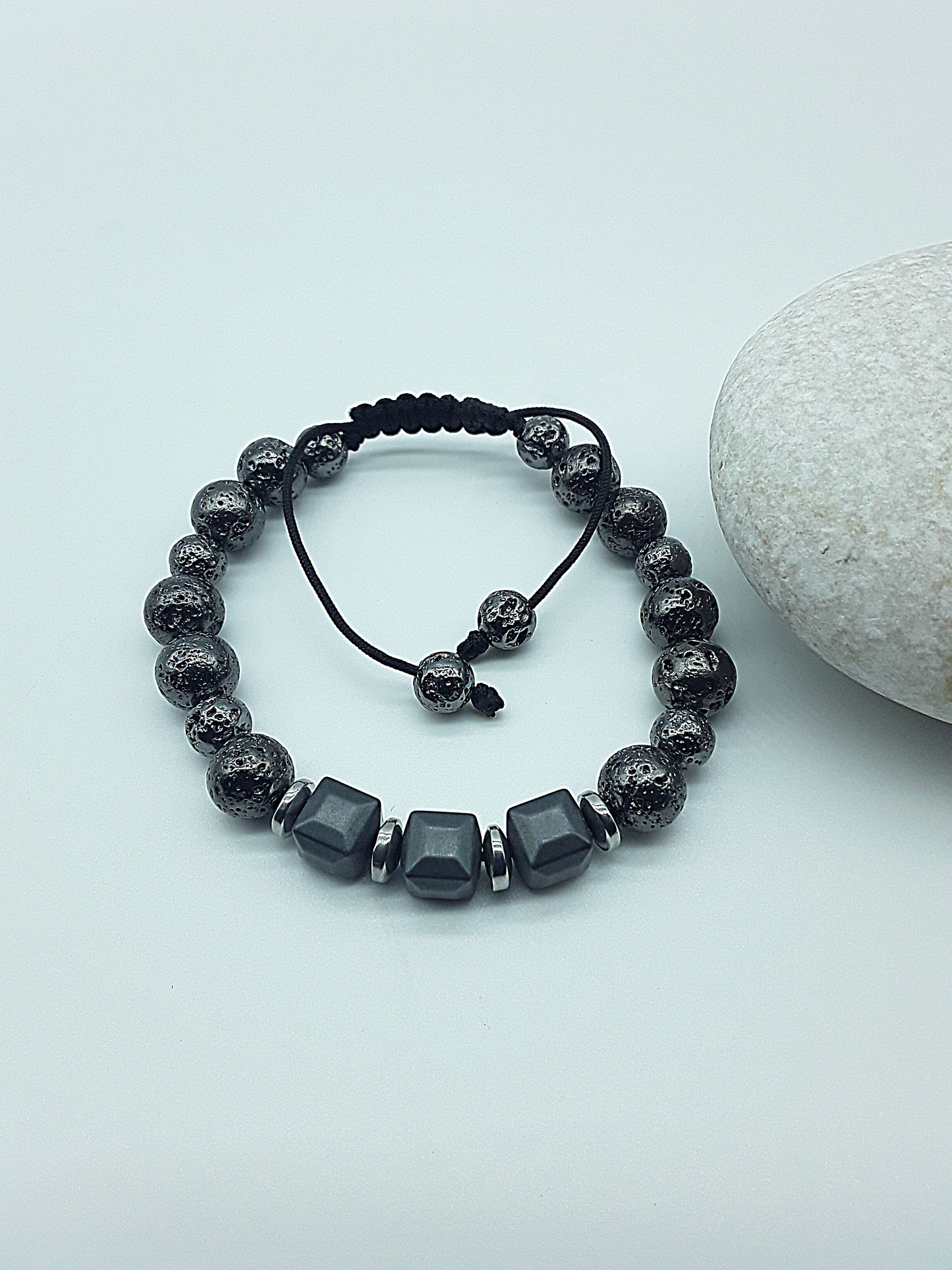 The Guardian’s Aegis Bracelet by Polmadeva – electroplated lava stone and hematite bracelet symbolizing protection, balance, and inner strength
