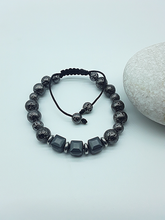 The Guardian’s Aegis Bracelet by Polmadeva – electroplated lava stone and hematite bracelet symbolizing protection, balance, and inner strength