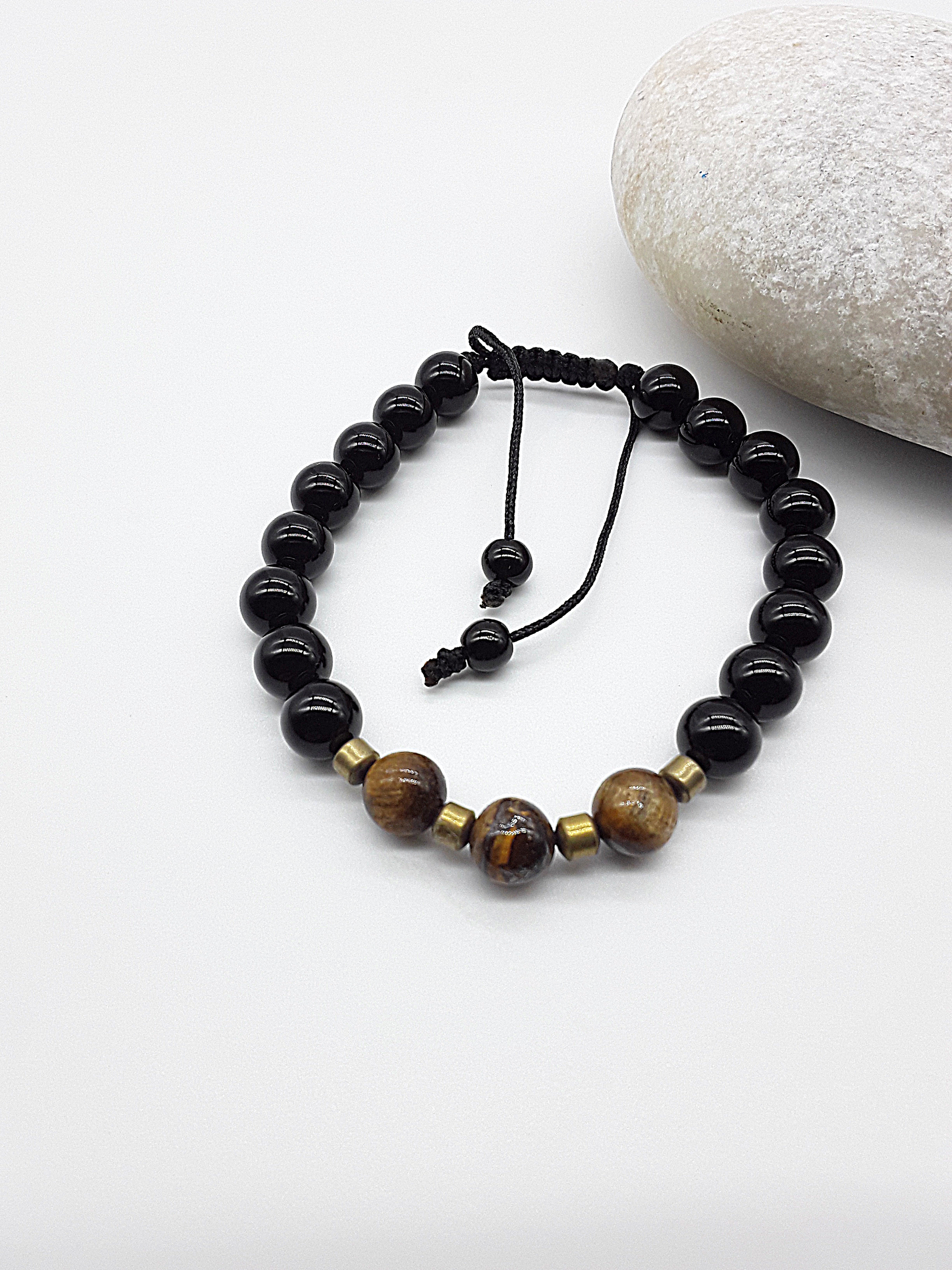 The Sentinel Bracelet by Polmadeva – black onyx, tiger eye and hematite bracelet symbolizing protection, balance, and quiet strength