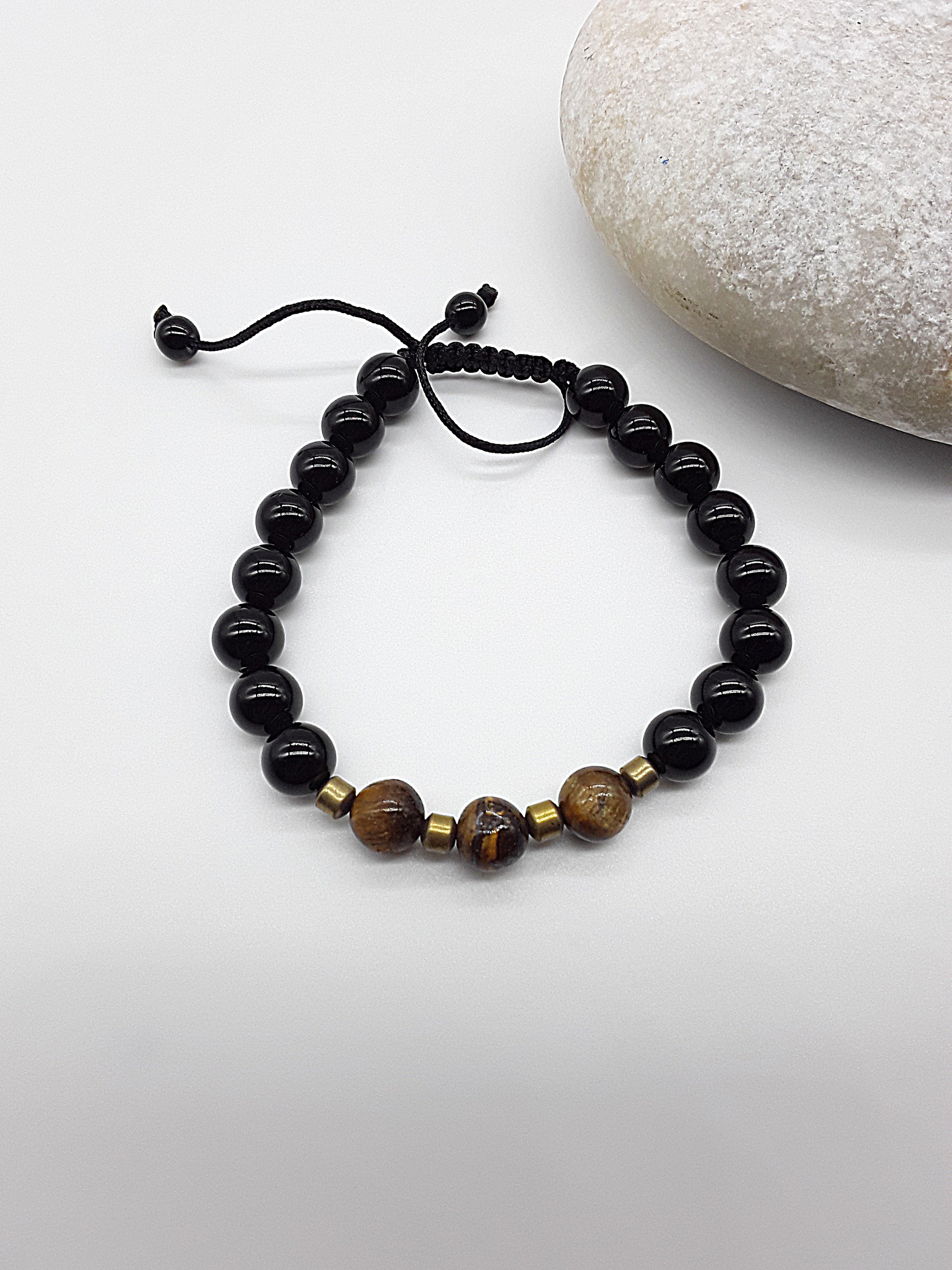 The Sentinel Bracelet by Polmadeva – black onyx, tiger eye and hematite bracelet symbolizing protection, balance, and quiet strength