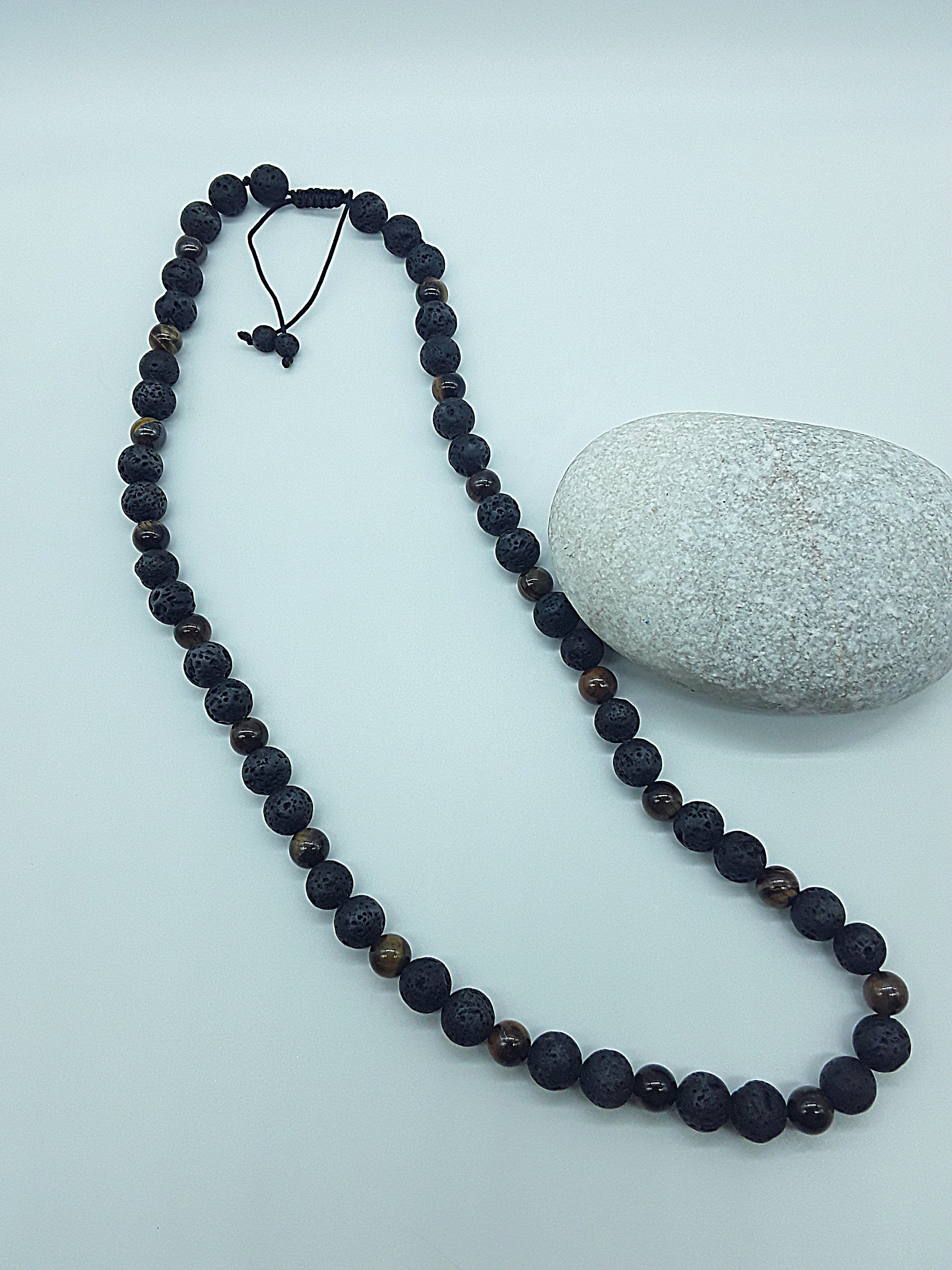 The Earthfire Vision Set by Polmadeva – handcrafted necklace & bracelet with Lava Stones and Tiger’s Eye, symbolizing courage, grounding & inner vision.