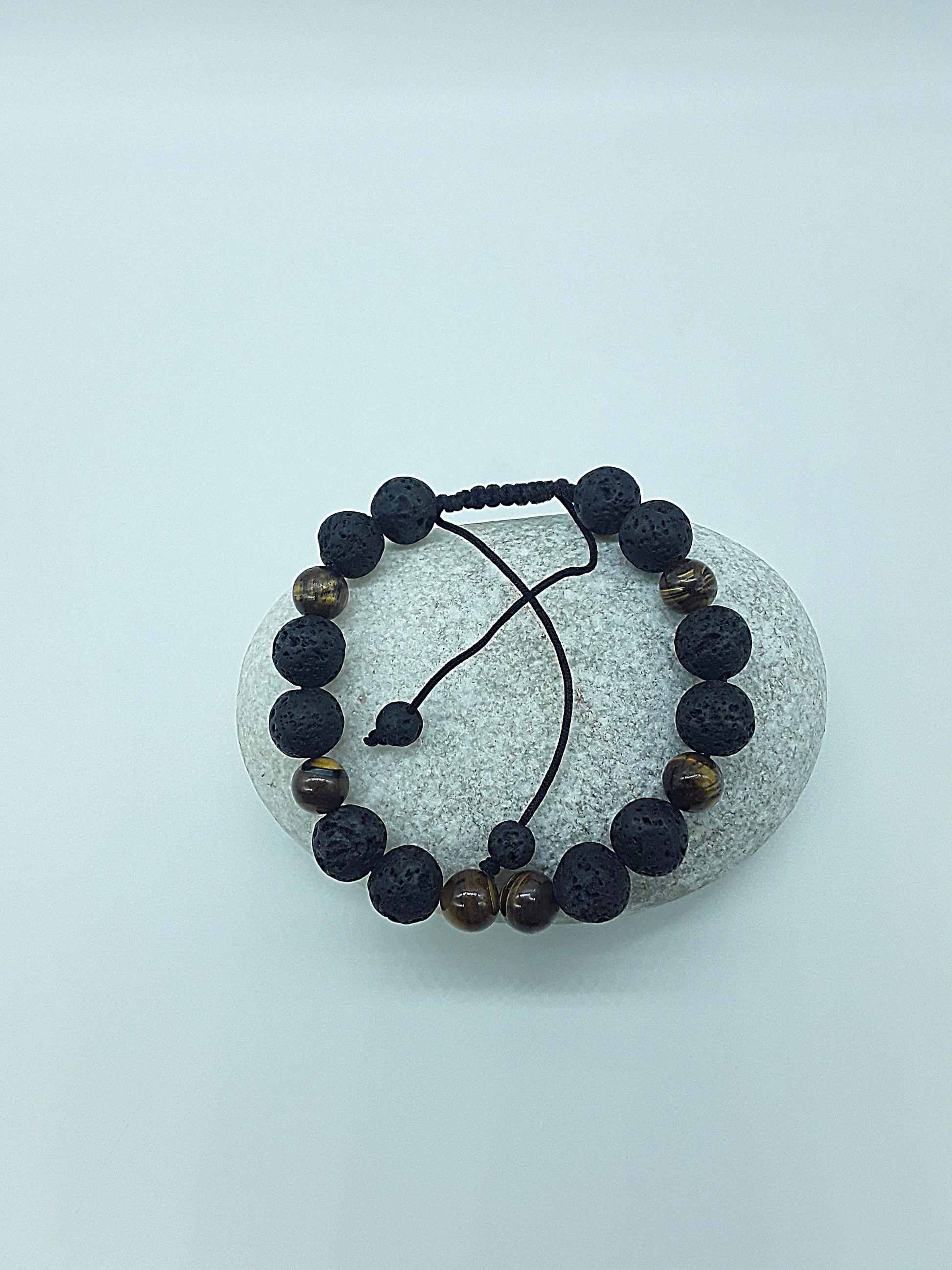 The Earthfire Vision Set by Polmadeva – handcrafted necklace & bracelet with Lava Stones and Tiger’s Eye, symbolizing courage, grounding & inner vision.