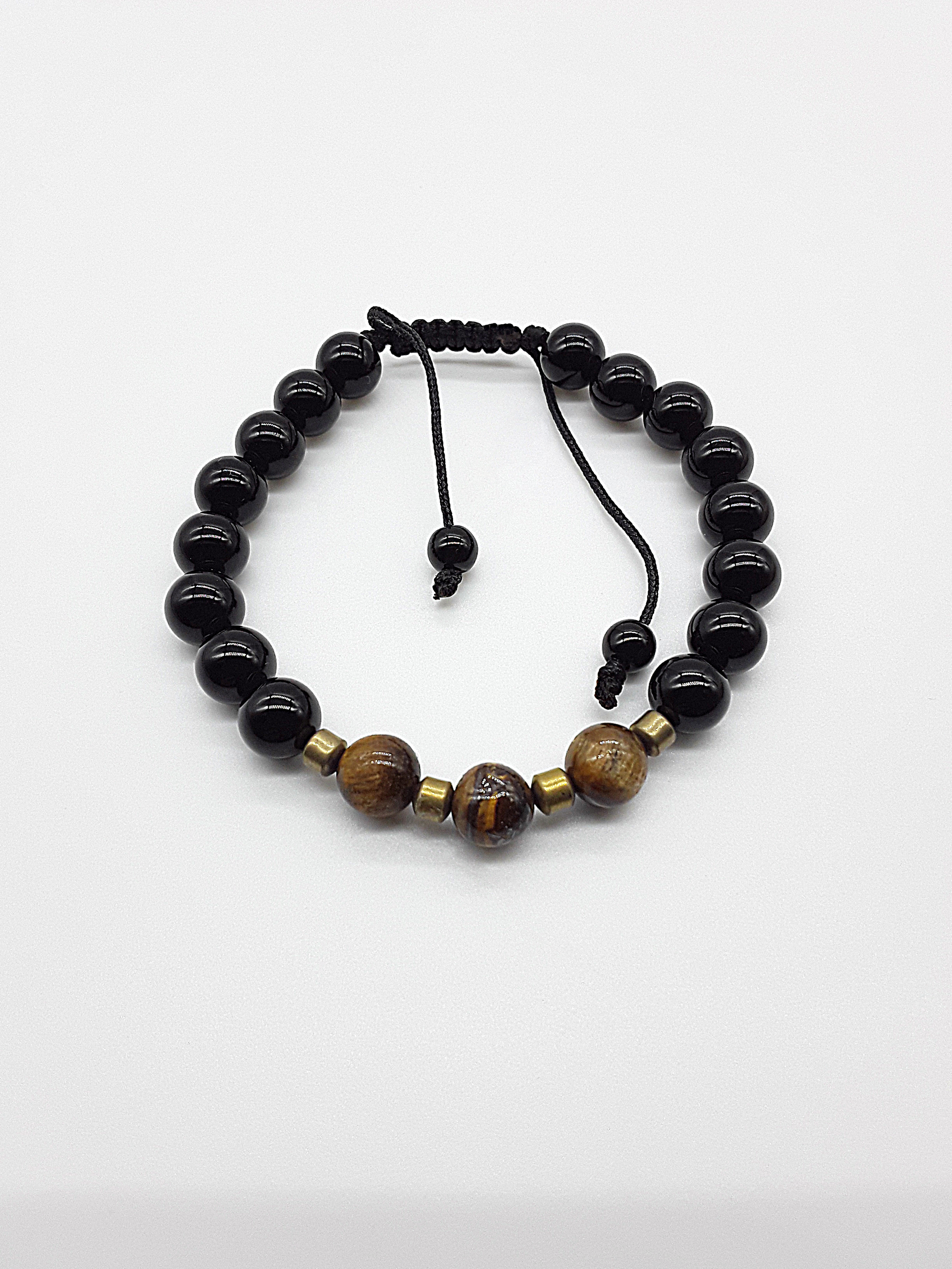 The Sentinel Bracelet by Polmadeva – black onyx, tiger eye and hematite bracelet symbolizing protection, balance, and quiet strength