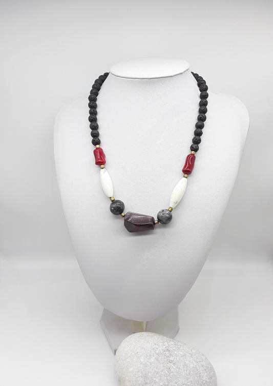 The Flamebound Necklace by Polmadeva – mookaite, lava stone, red coral, turquoise and hematite necklace symbolizing courage, fire, and transformation