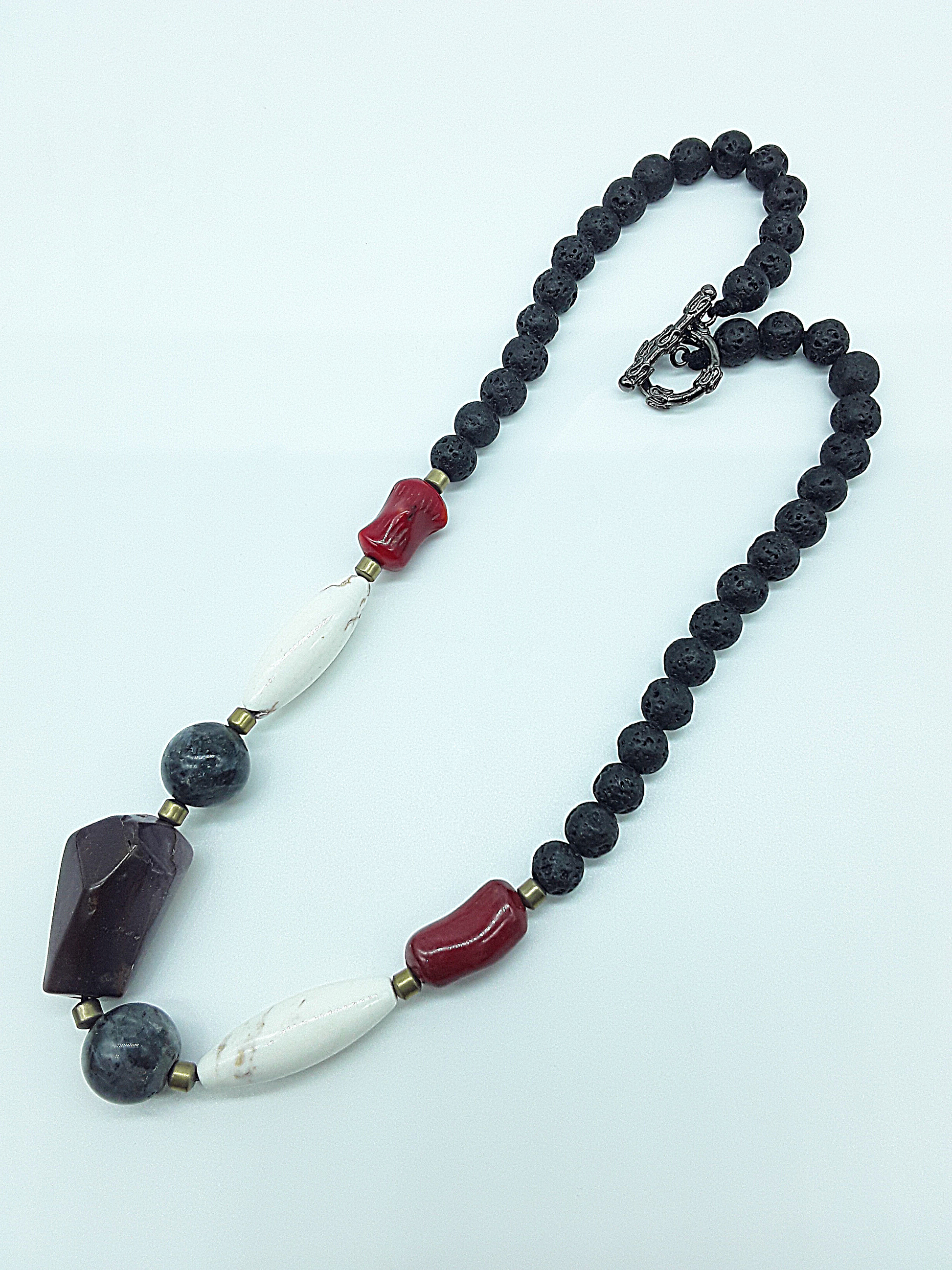The Flamebound Necklace by Polmadeva – mookaite, lava stone, red coral, turquoise and hematite necklace symbolizing courage, fire, and transformation