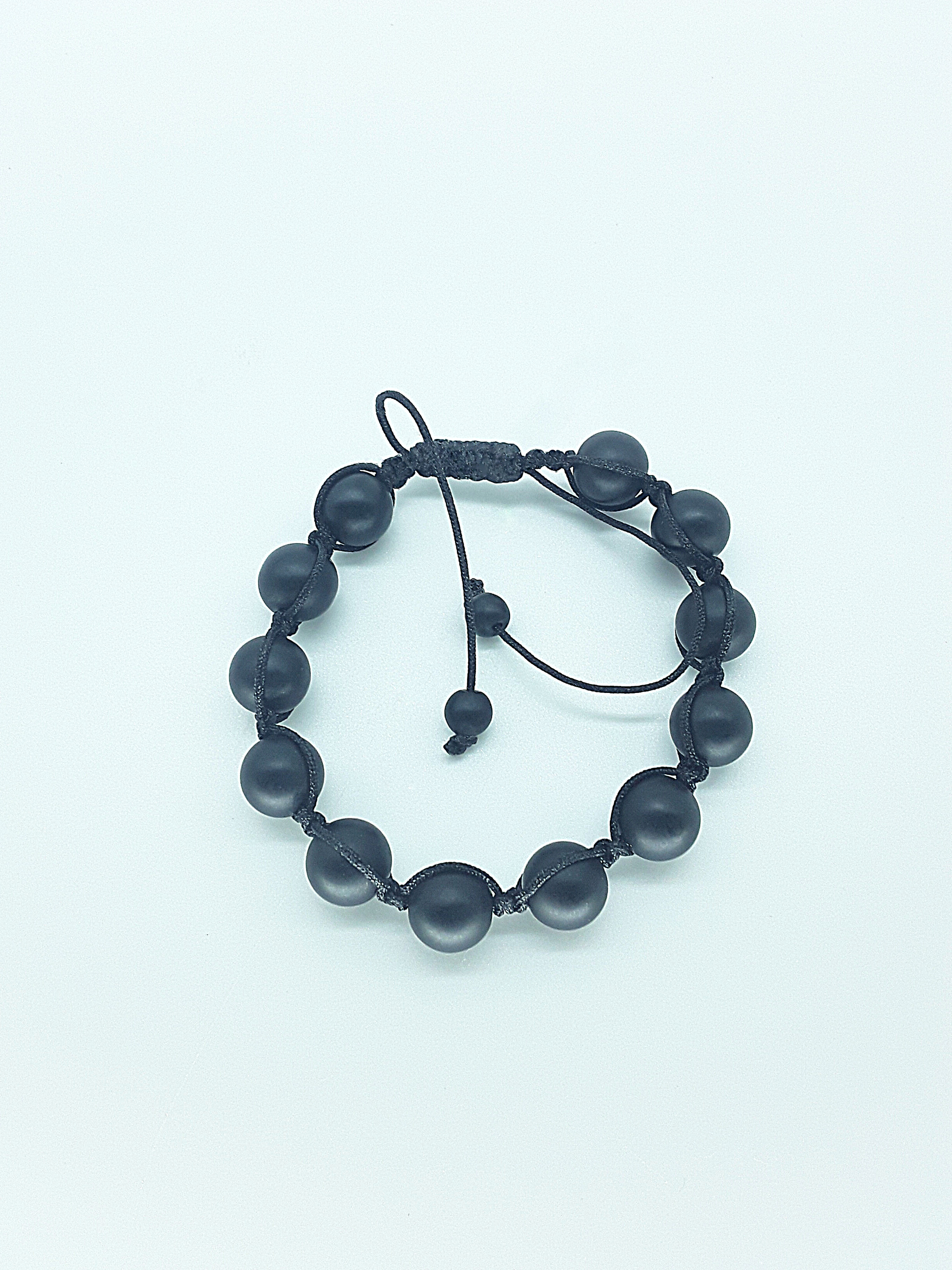 The Quiet Onyvara Bracelet by Polmadeva – black onyx adjustable bracelet symbolizing protection, inner clarity, and quiet strength