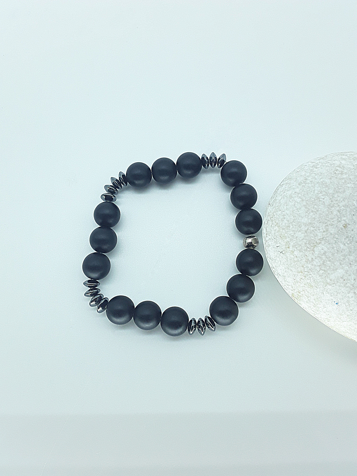 The Fortis Bracelet by Polmadeva – black onyx and hematite bracelet symbolizing strength, grounding, and inner protection