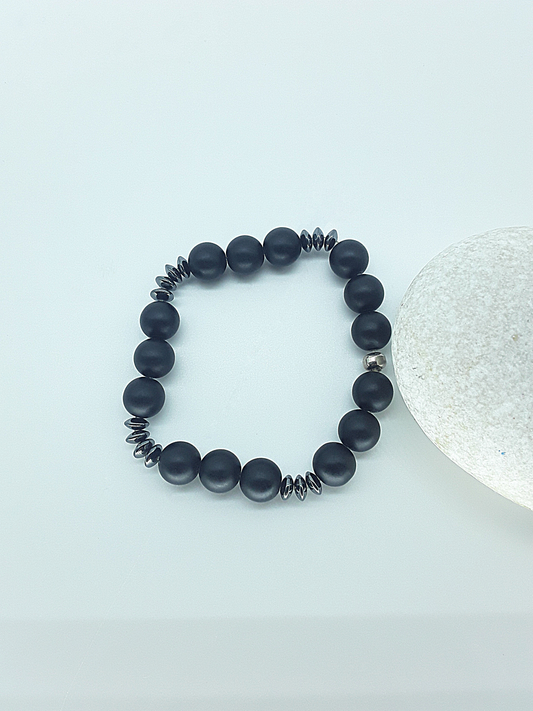 The Fortis Bracelet by Polmadeva – black onyx and hematite bracelet symbolizing strength, grounding, and inner protection