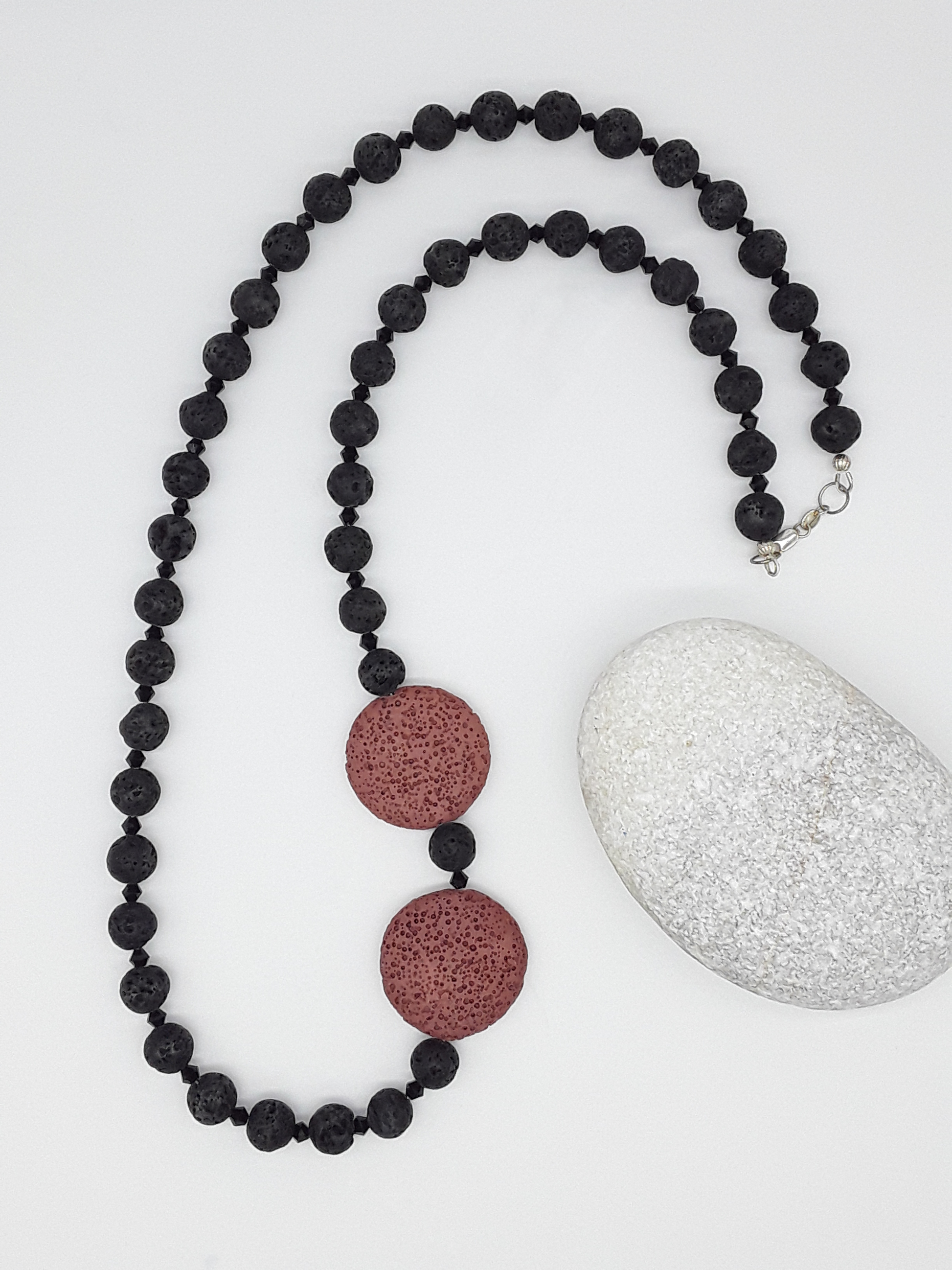 The Emberstone Necklace by Polmadeva – black and red lava stone necklace with Swarovski crystals and 925 silver symbolizing inner fire and strength