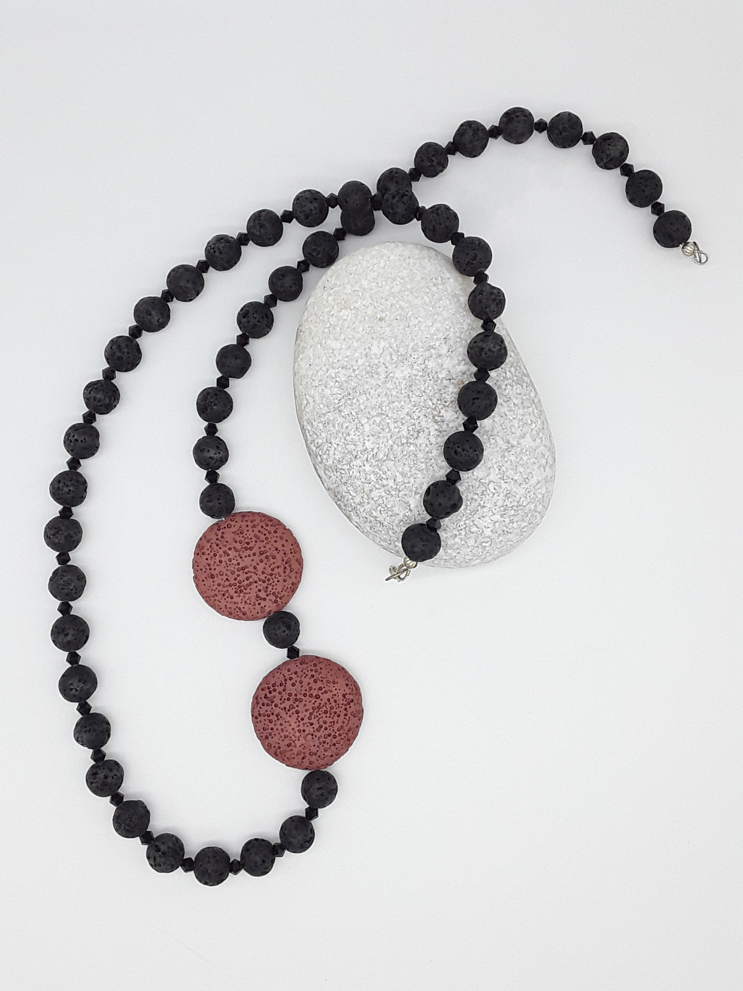 The Emberstone Necklace by Polmadeva – black and red lava stone necklace with Swarovski crystals and 925 silver symbolizing inner fire and strength
