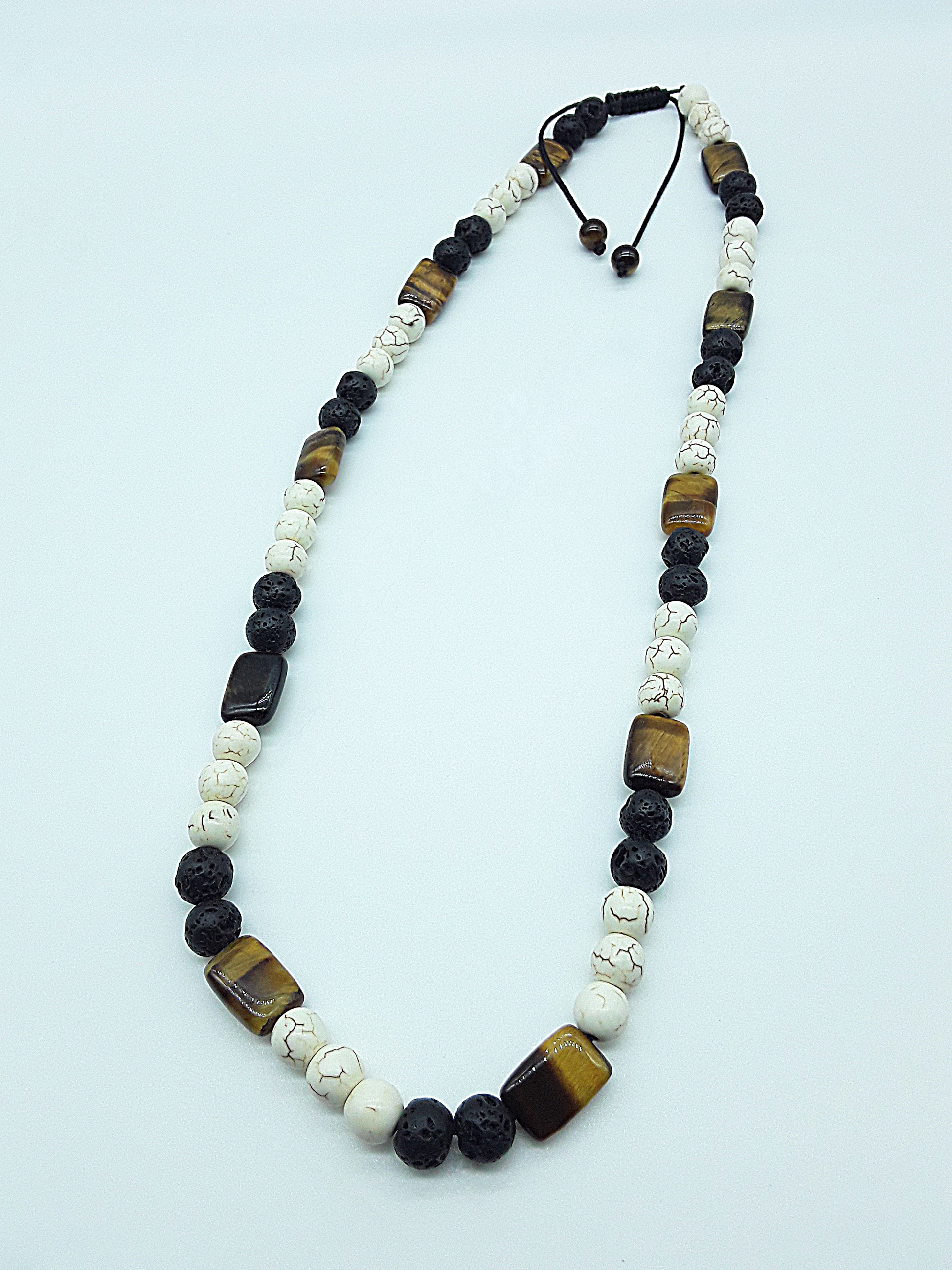 The Stone of Three Paths Set by Polmadeva – handcrafted necklace & bracelet with Lava Stone, Tiger’s Eye & Howlite, symbolizing vision, grounding & harmony.