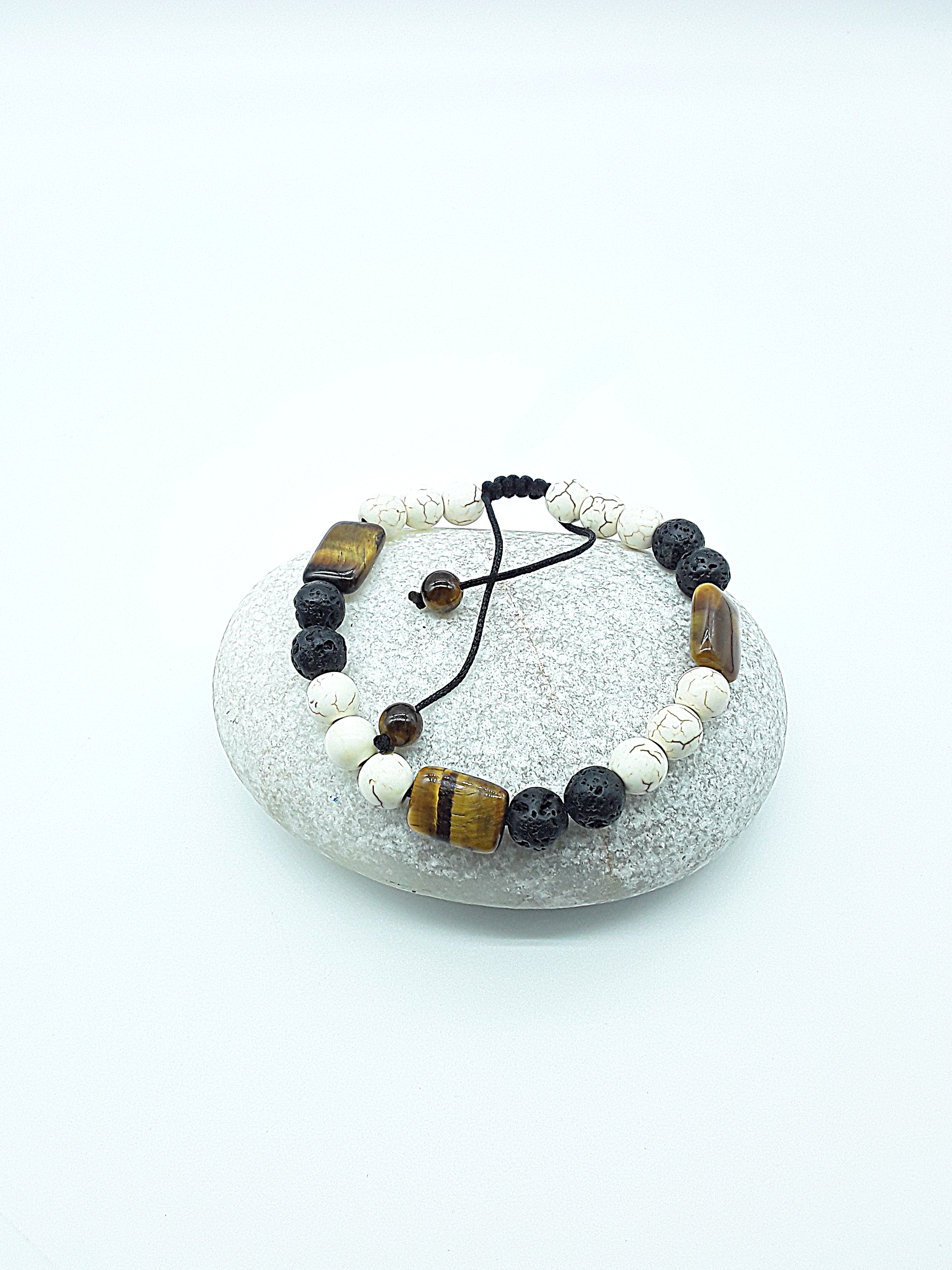 The Stone of Three Paths Set by Polmadeva – handcrafted necklace & bracelet with Lava Stone, Tiger’s Eye & Howlite, symbolizing vision, grounding & harmony.