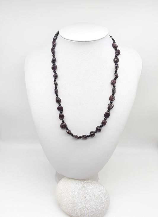 The Sigilguard Necklace by Polmadeva – garnet and onyx necklace with sigil pendant symbolizing protection, courage, and resilience