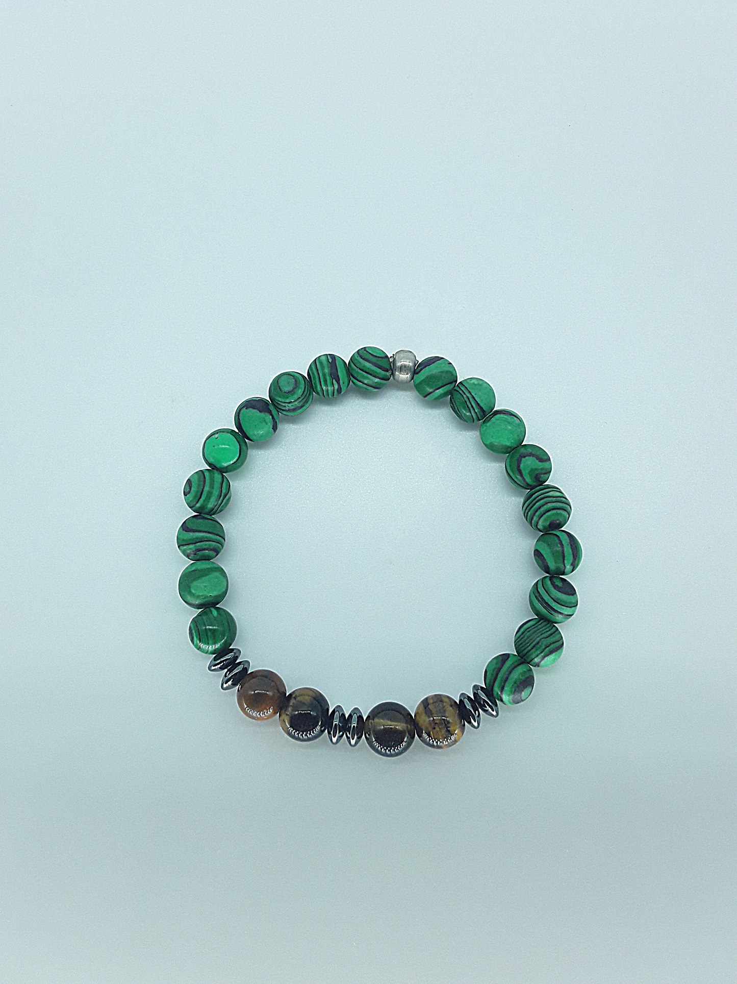 The Warrior’s Path Bracelet by Polmadeva – malachite, tiger’s eye and hematite bracelet symbolizing courage, resilience, and inner strength
