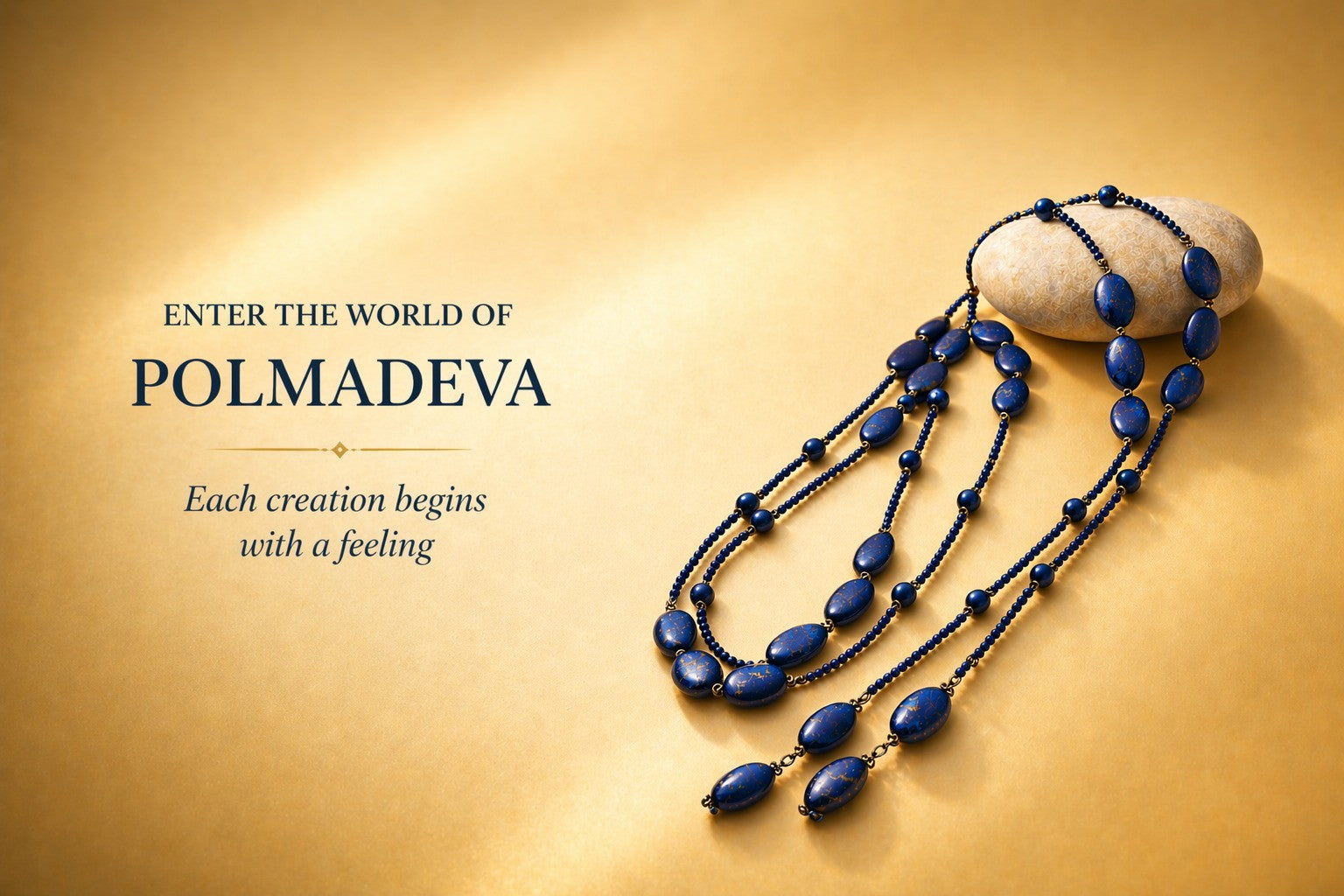 Blue beaded necklace on a stone with 'Polmadeva' branding and tagline on a gold background