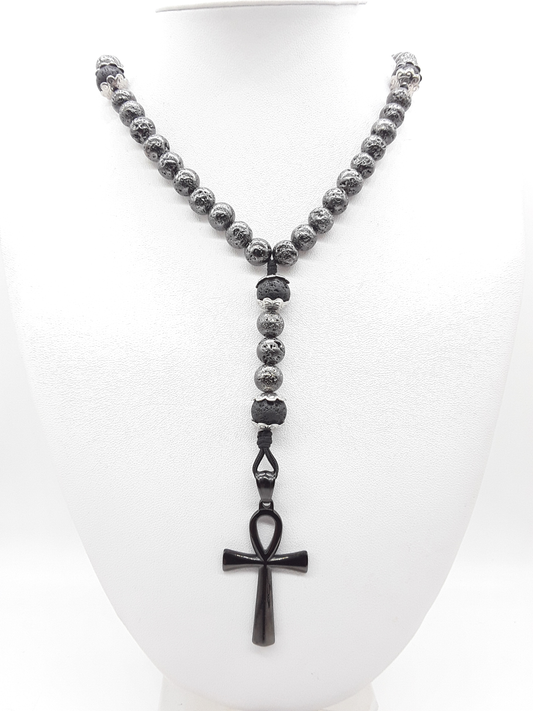 Held in Continuity — Galvanized Lava & Silver Ankh Catholic Rosary (5 Decade) by Polmadeva with black stainless steel Ankh cross on white background.