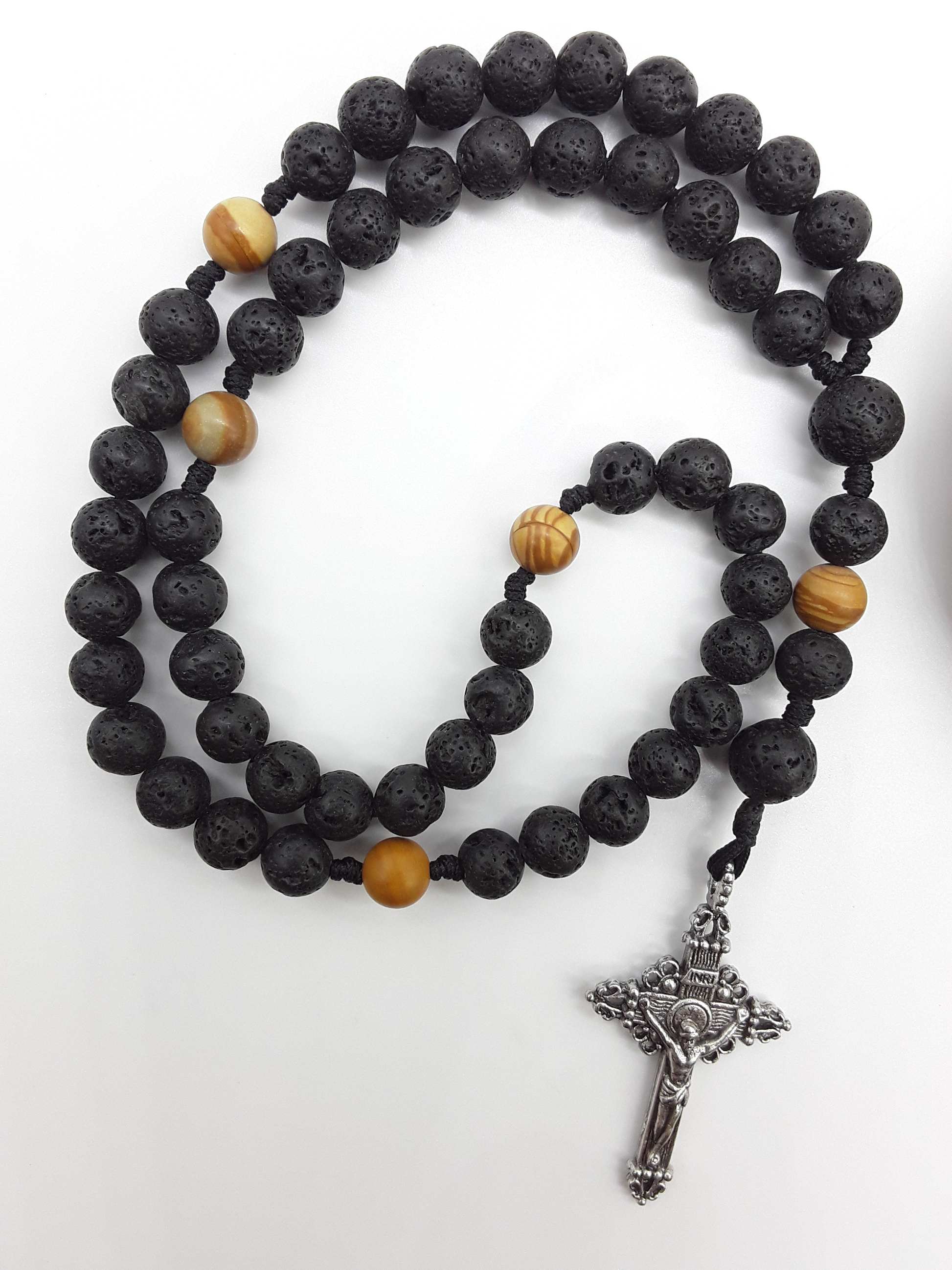 Pocket & Travel Catholic Rosary in lava and tigerskin jasper with tin crucifix, arranged in a compact circular form on a white background.