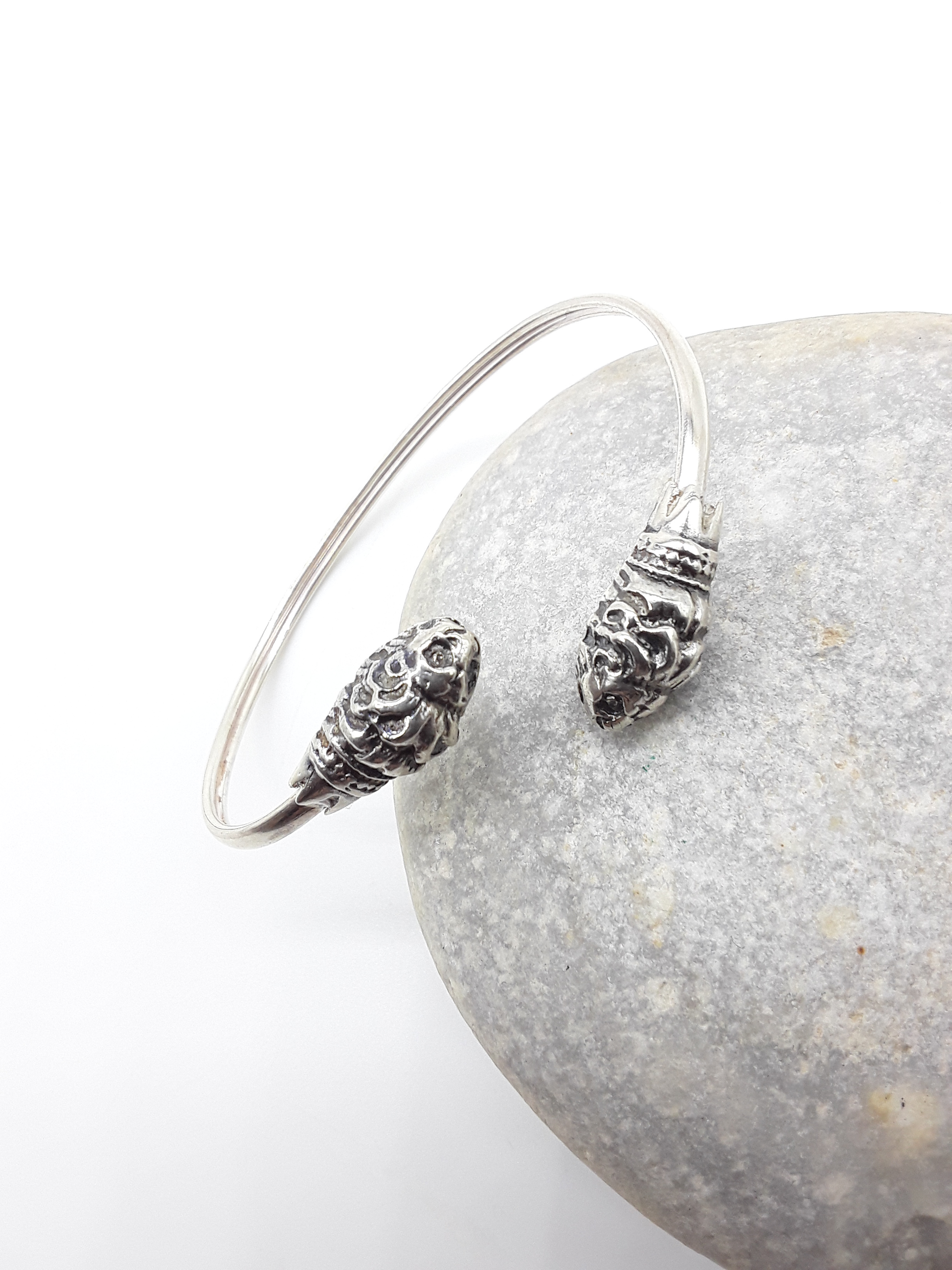Lion Presence sterling silver cuff bracelet on stone — Polmadeva