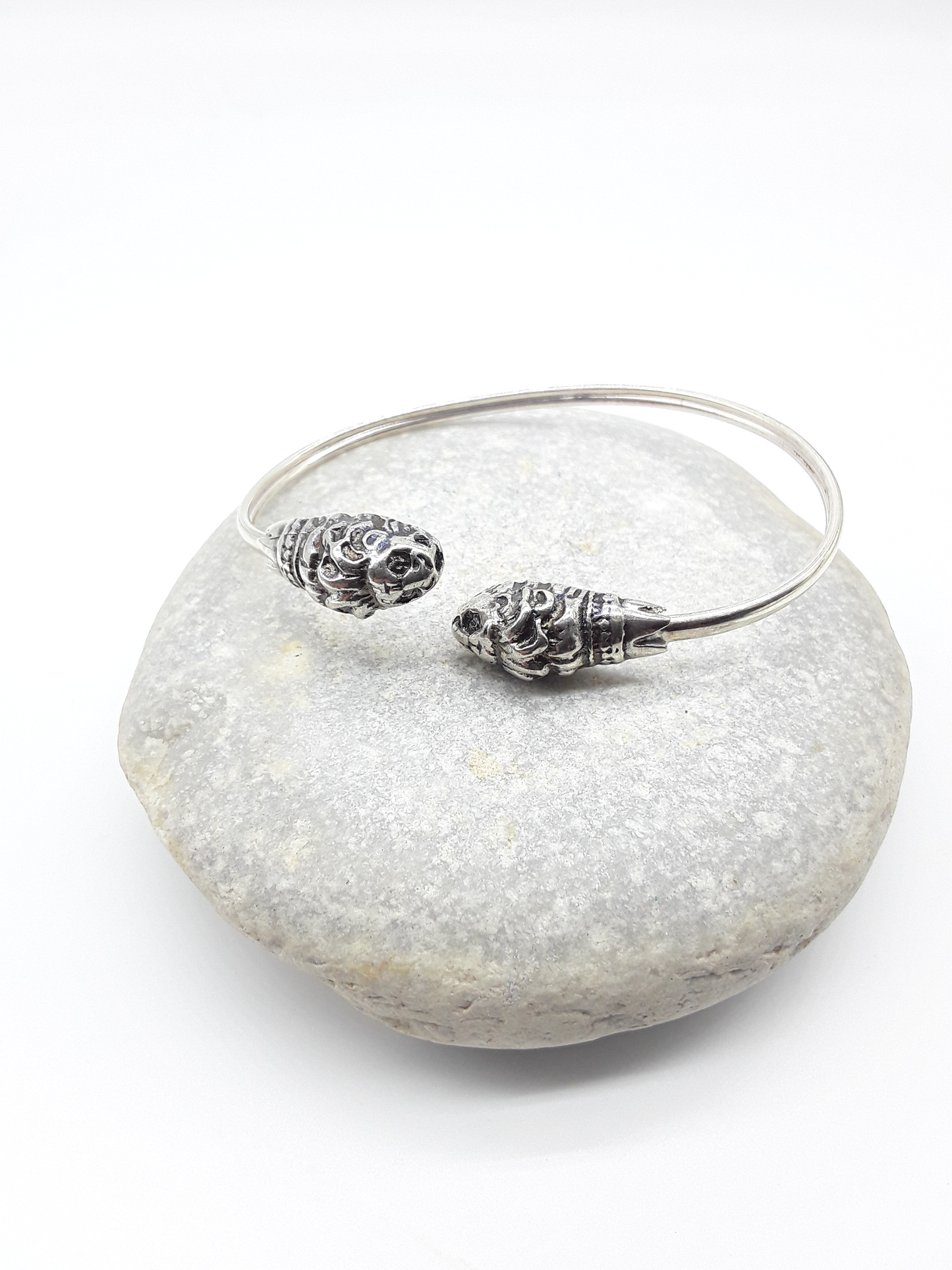 Lion Presence sterling silver cuff bracelet on stone — Polmadeva