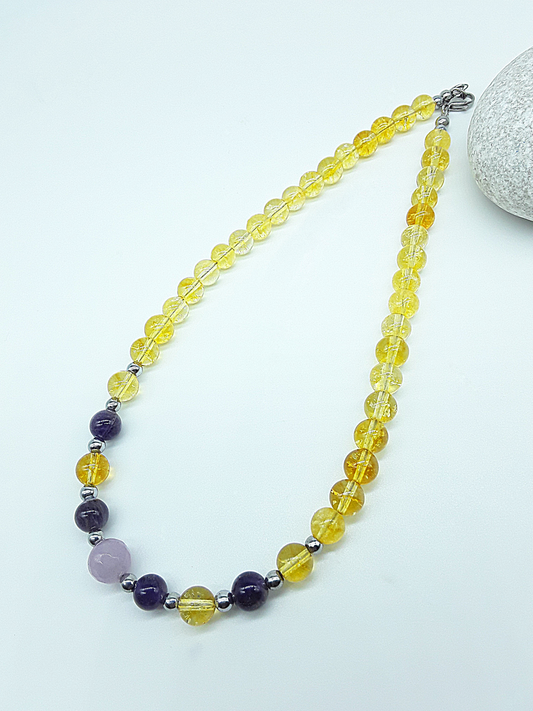 Luminous Ascent Necklace by Polmadeva with citrine, amethyst, crystal quartz and hematite gemstones, handcrafted natural gemstone necklace, side view.