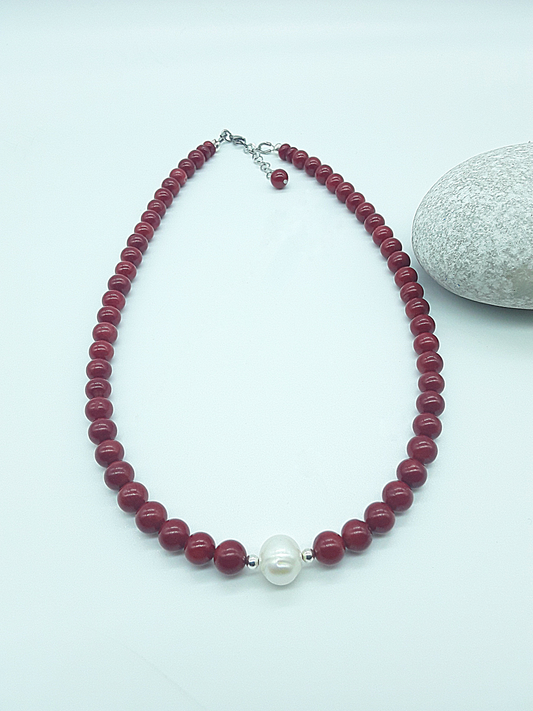 Rise with Fire Necklace crafted with red coral beads and a central pearl, symbolizing courage, vitality, and inner fire, Polmadeva Courage Rising collection