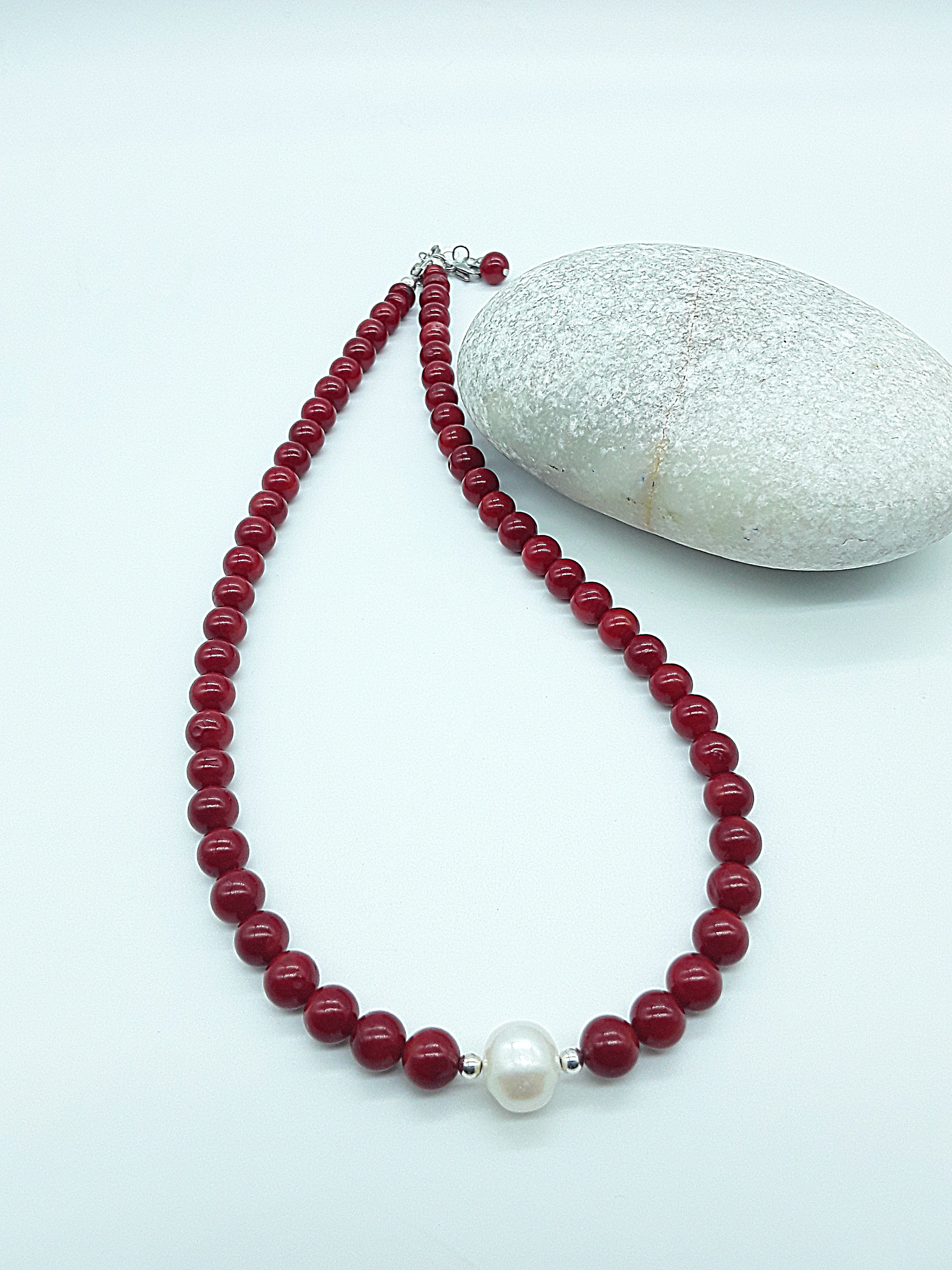 Rise with Fire Necklace crafted with red coral beads and a central pearl, symbolizing courage, vitality, and inner fire, Polmadeva Courage Rising collection