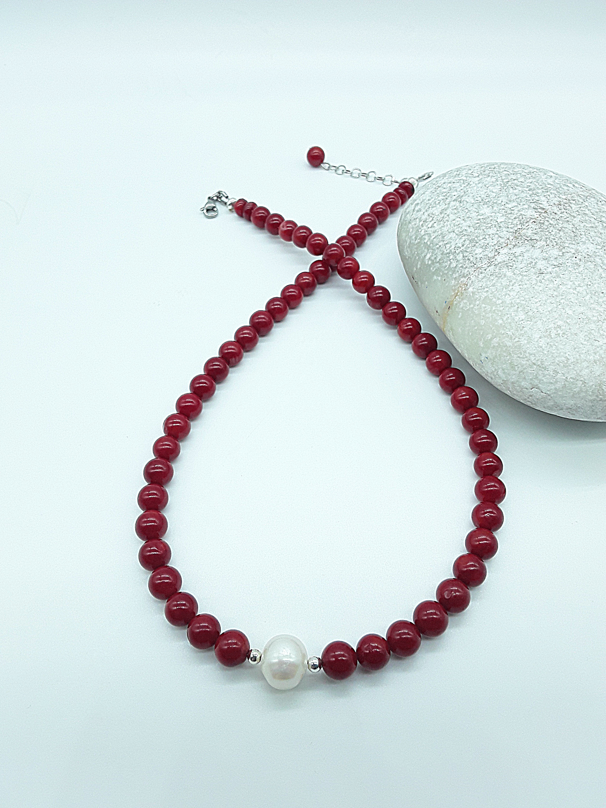 Rise with Fire Necklace crafted with red coral beads and a central pearl, symbolizing courage, vitality, and inner fire, Polmadeva Courage Rising collection