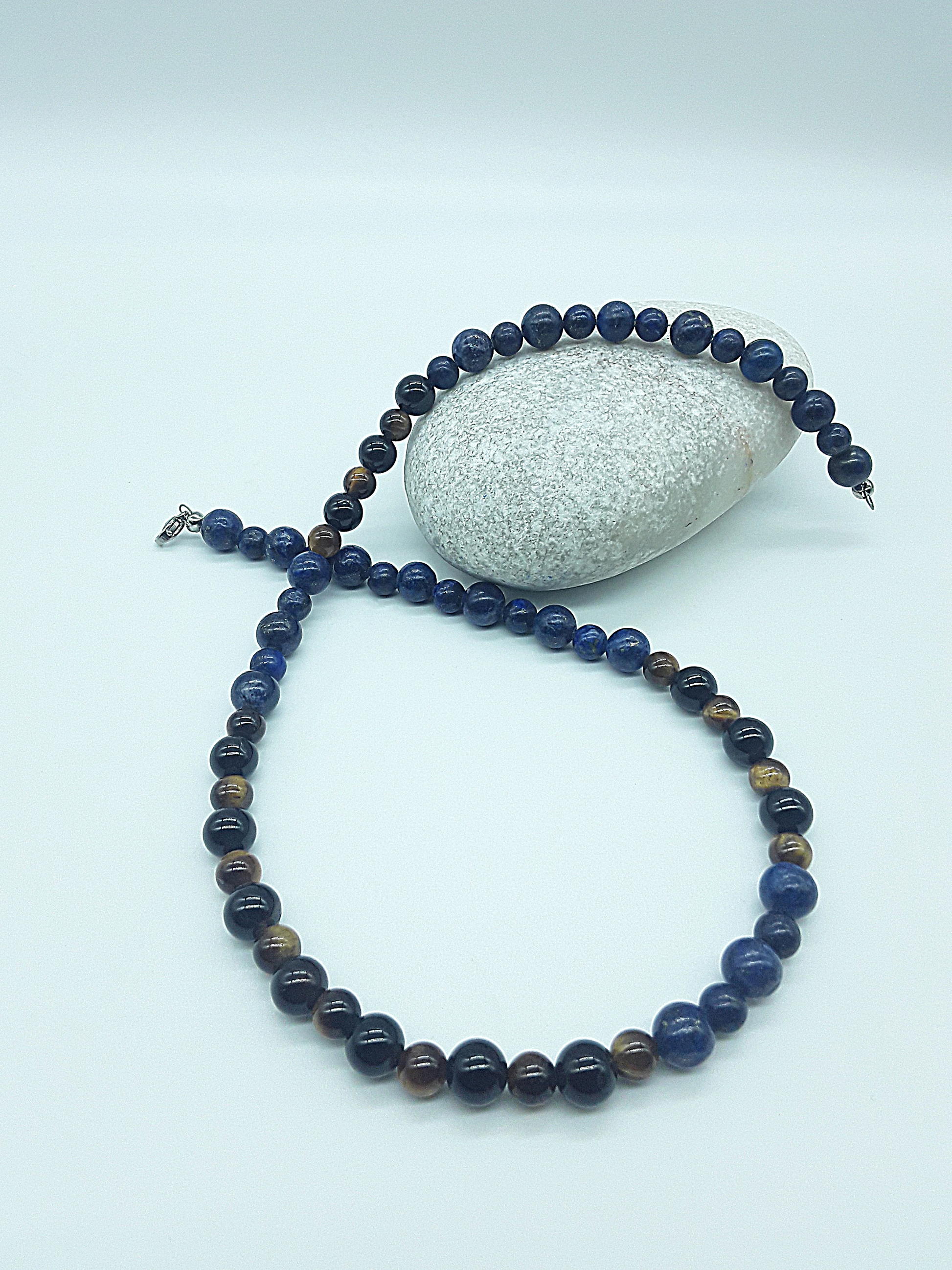 Polmadeva Inner Sight Necklace with lapis lazuli, tiger’s eye and black onyx beads draped around natural stone, Soul Vision collection