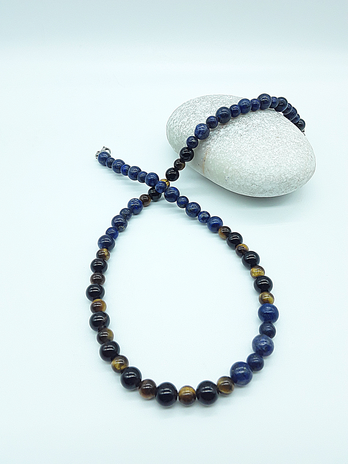 Polmadeva Inner Sight Necklace with lapis lazuli, tiger’s eye and black onyx beads forming looped composition around natural stone, Soul Vision collection