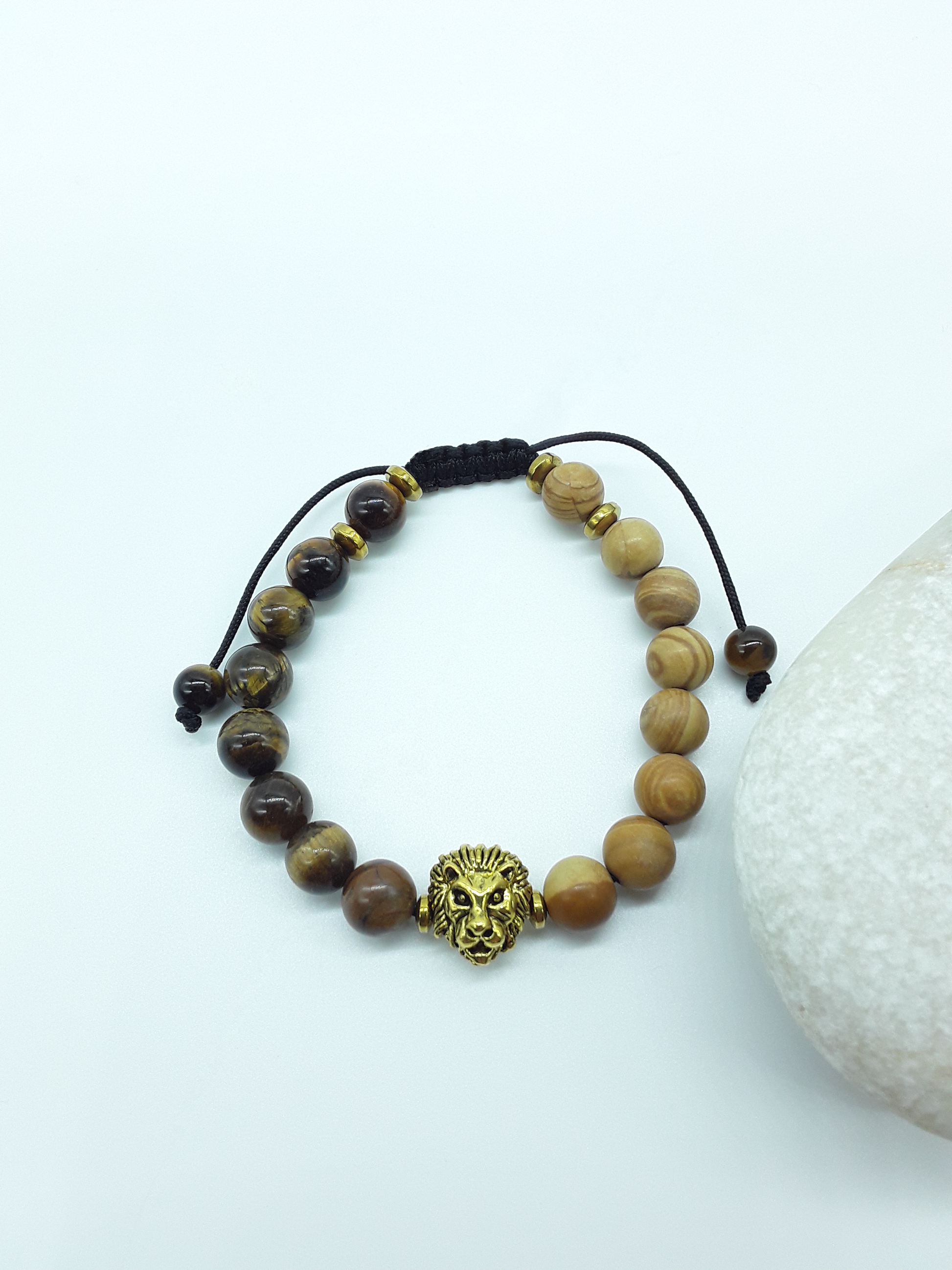 The Kept Ground bracelet with Tiger’s Eye and Jasper beads and gold-toned lion centerpiece