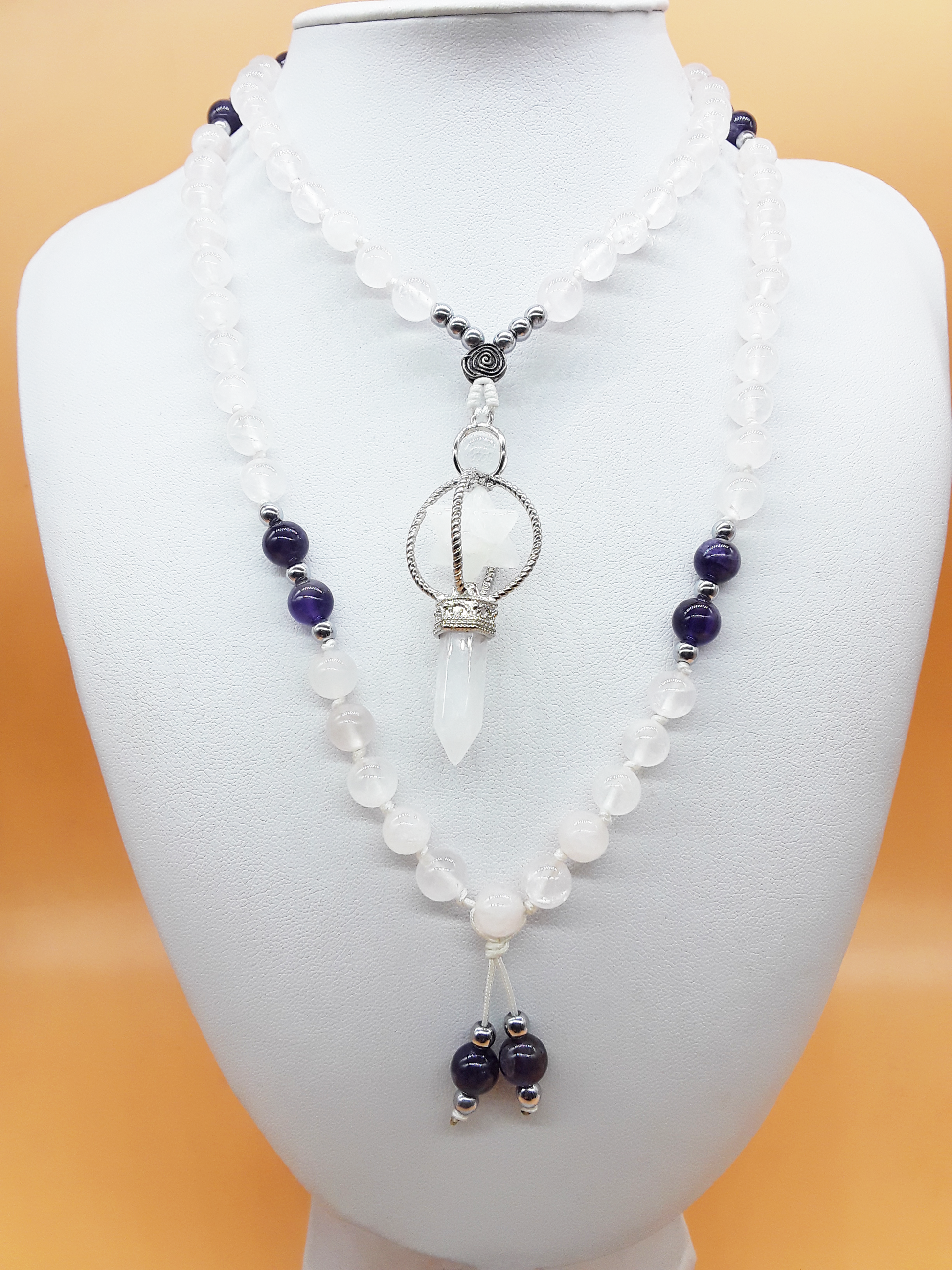 Quartz and Amethyst Mala Beads with Natural Quartz Crystal pendant displayed on white mannequin, Polmadeva