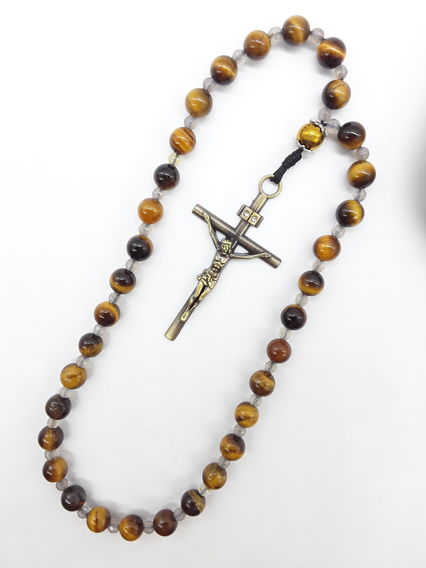 The Quiet Return — Tiger’s Eye Orthodox Rosary by Polmadeva, handcrafted with Tiger’s Eye beads, Hematite elements, Agate spacers, and a bronze zircon cross, photographed on a clean white background.