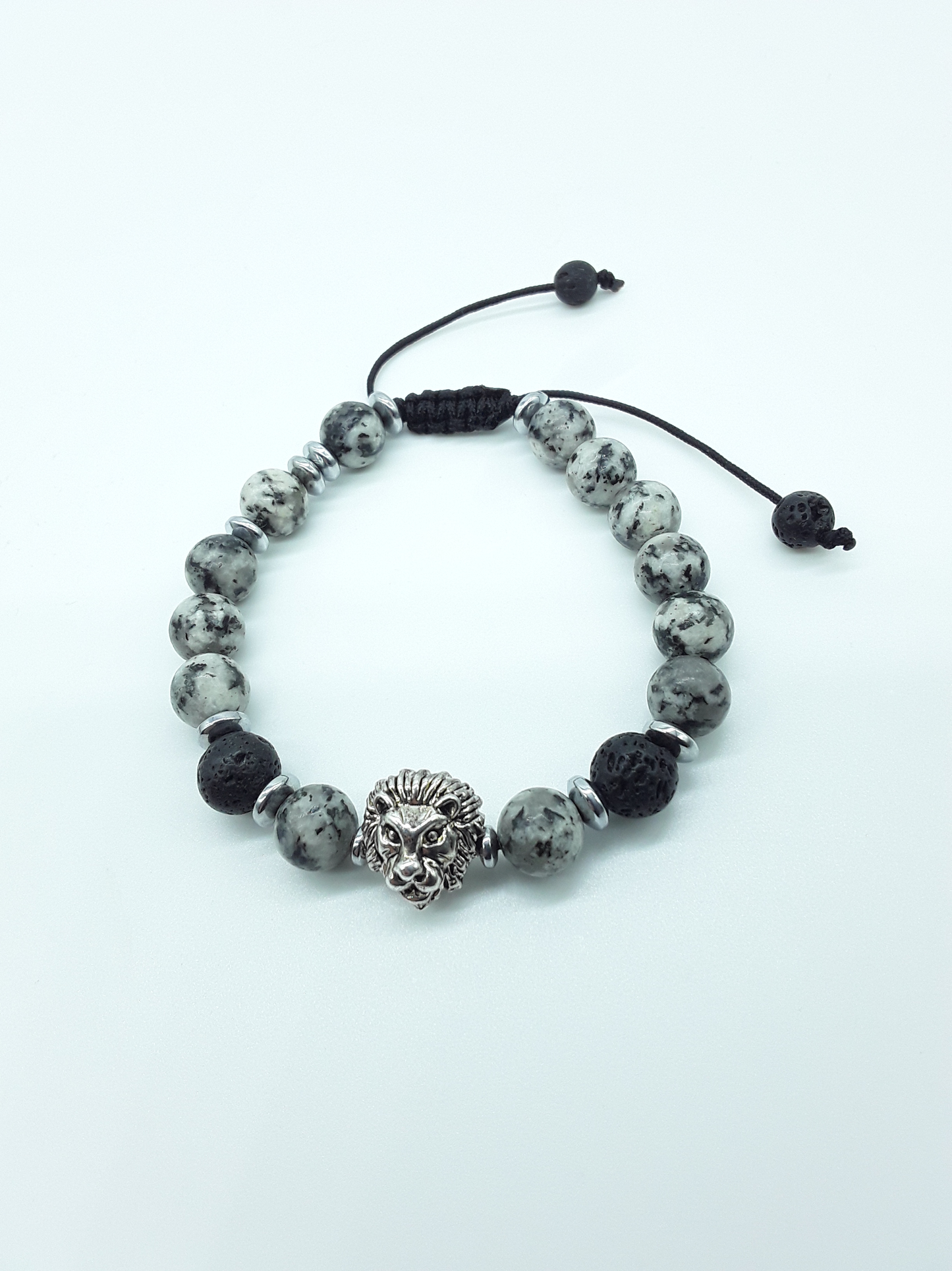 Jasper and lava lion bracelet with natural 8mm beads and hematite accents on a white background