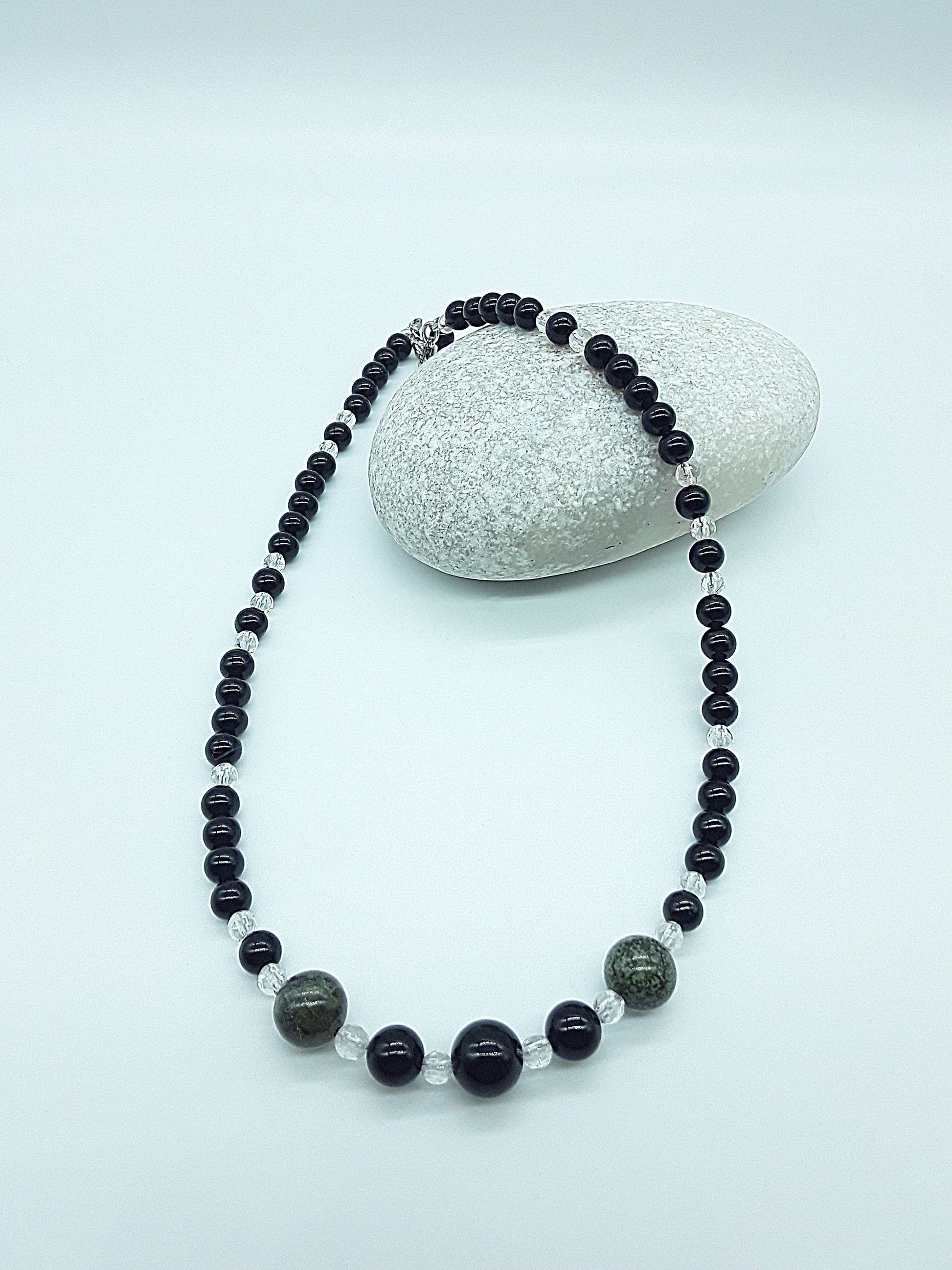 Guardian Spirit necklace with black onyx and quartz crystal beads, symbol of silent protection and presence