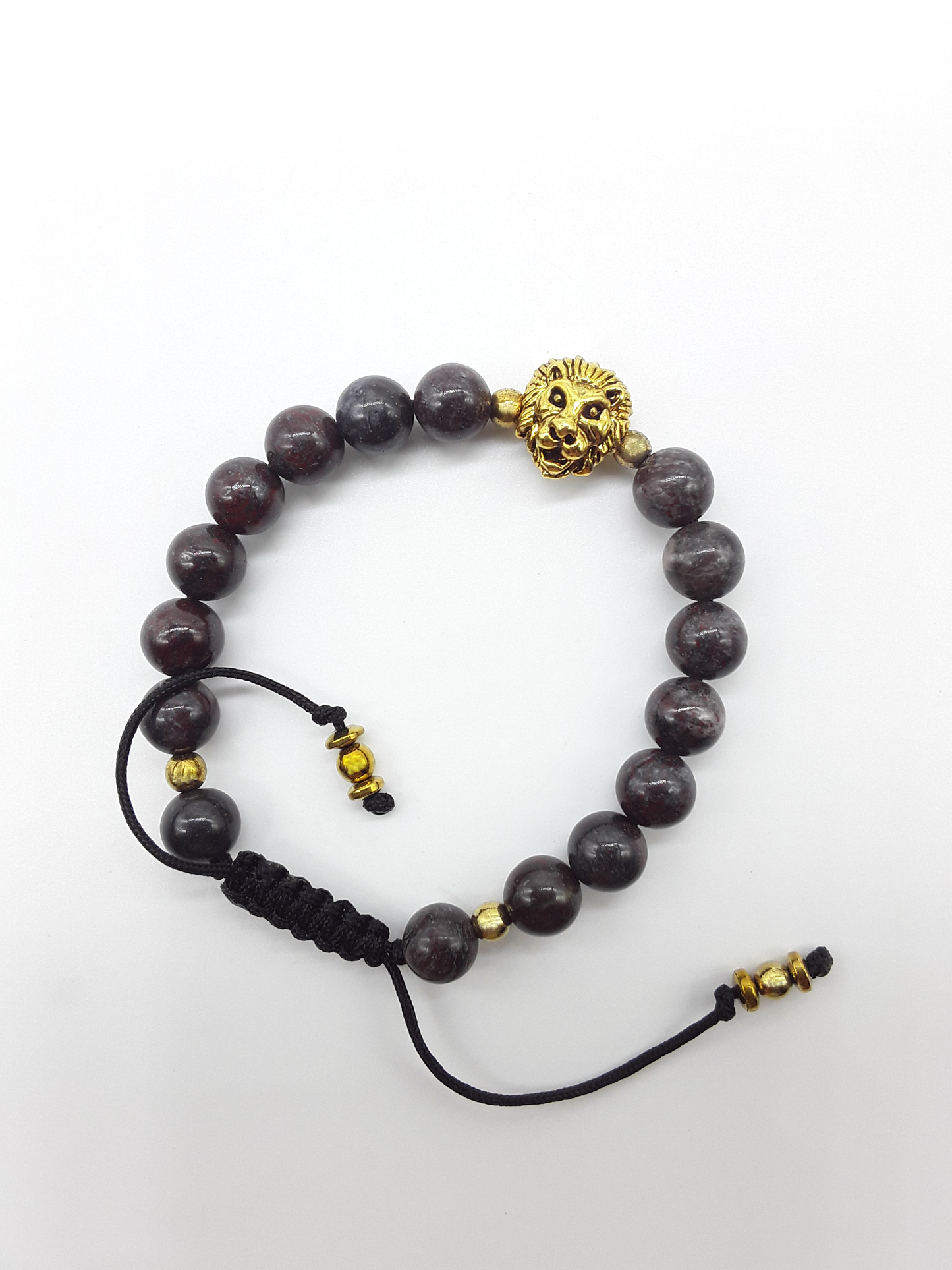 Bloodstone lion bracelet with hematite accents on a white background