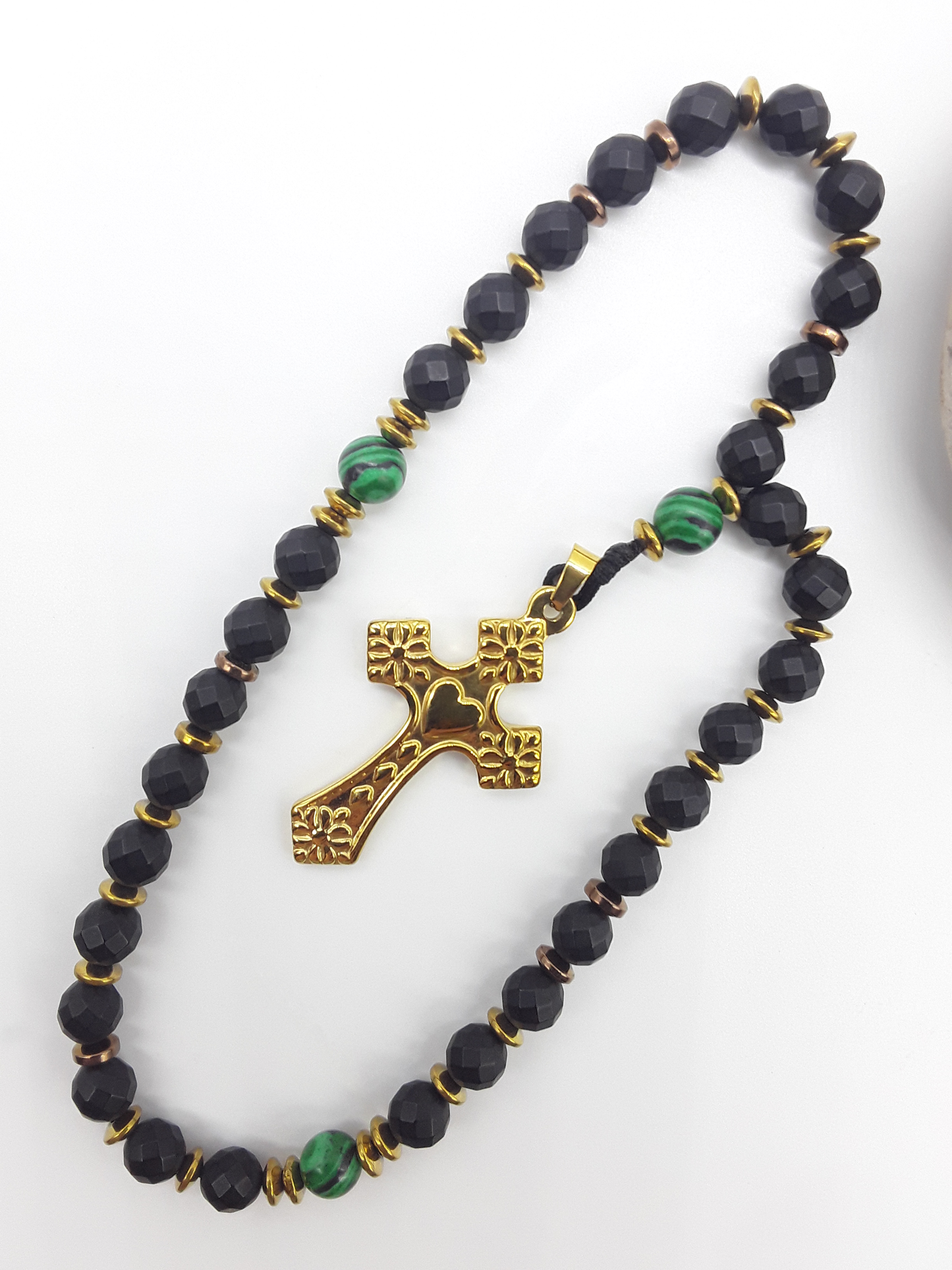 The Verdant Vigil — Black Onyx & Malachite Orthodox Rosary by Polmadeva, faceted black onyx beads with malachite accents and stainless steel cross, photographed on a clean white background.