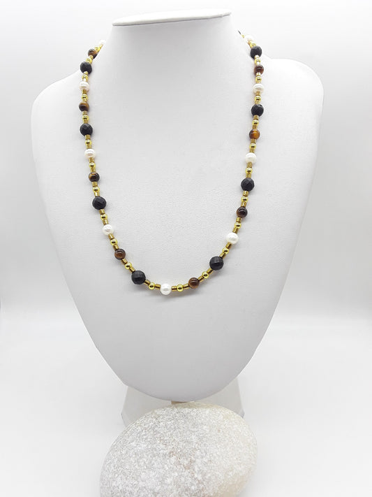 The Guardian Pearl Necklace by Polmadeva – pearl, onyx, tiger’s eye and hematite necklace symbolizing serenity, grounding, and protection